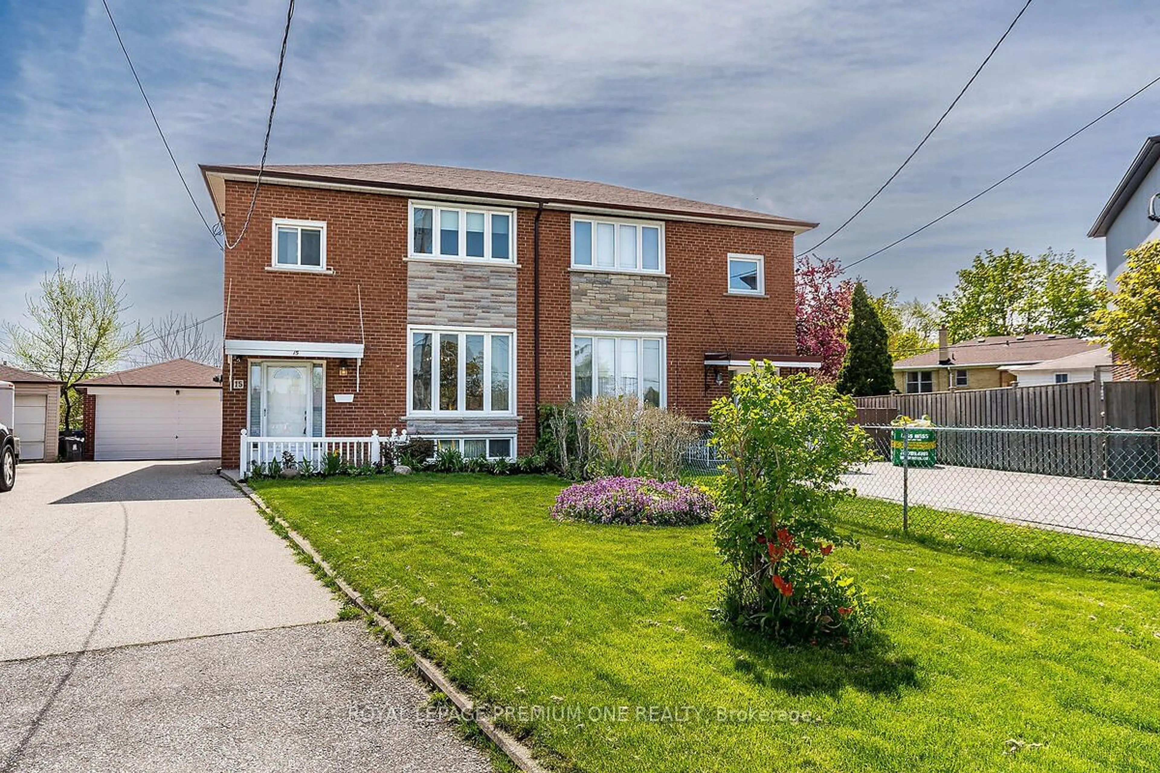 Home with brick exterior material for 15 Talent Cres, Toronto Ontario M9M 2N5