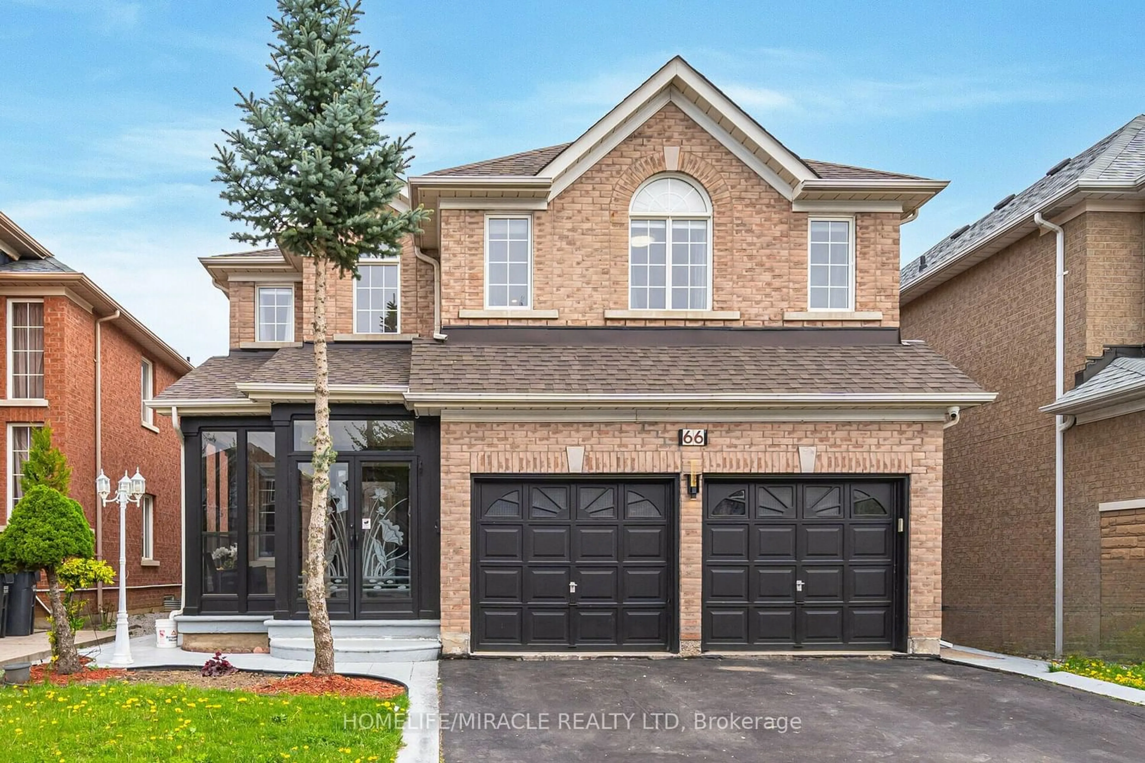 Home with brick exterior material for 66 Olde Town Rd, Brampton Ontario L6X 4X9