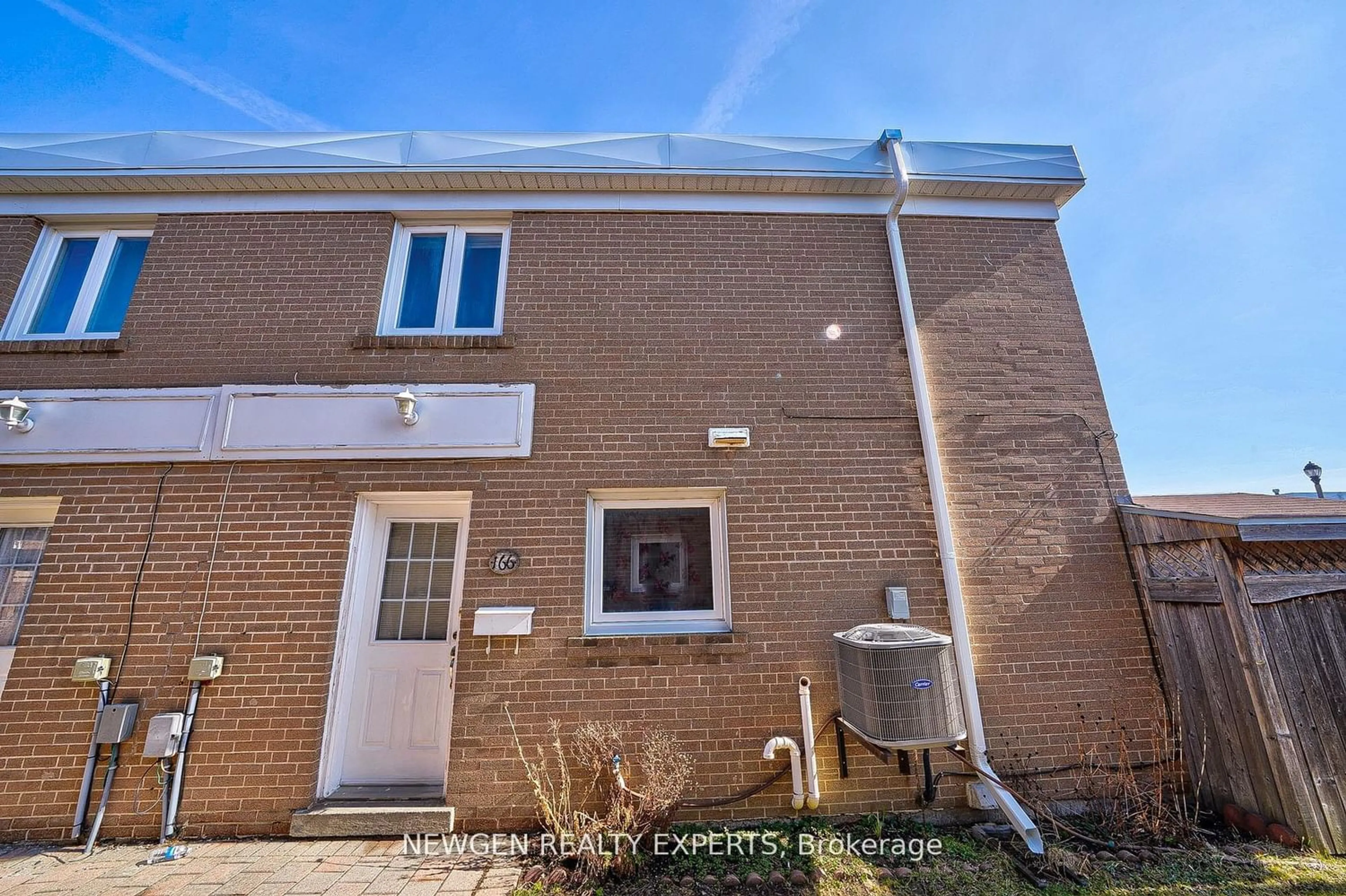 A pic from exterior of the house or condo for 166 Town House Cres #52, Brampton Ontario L6W 3C6