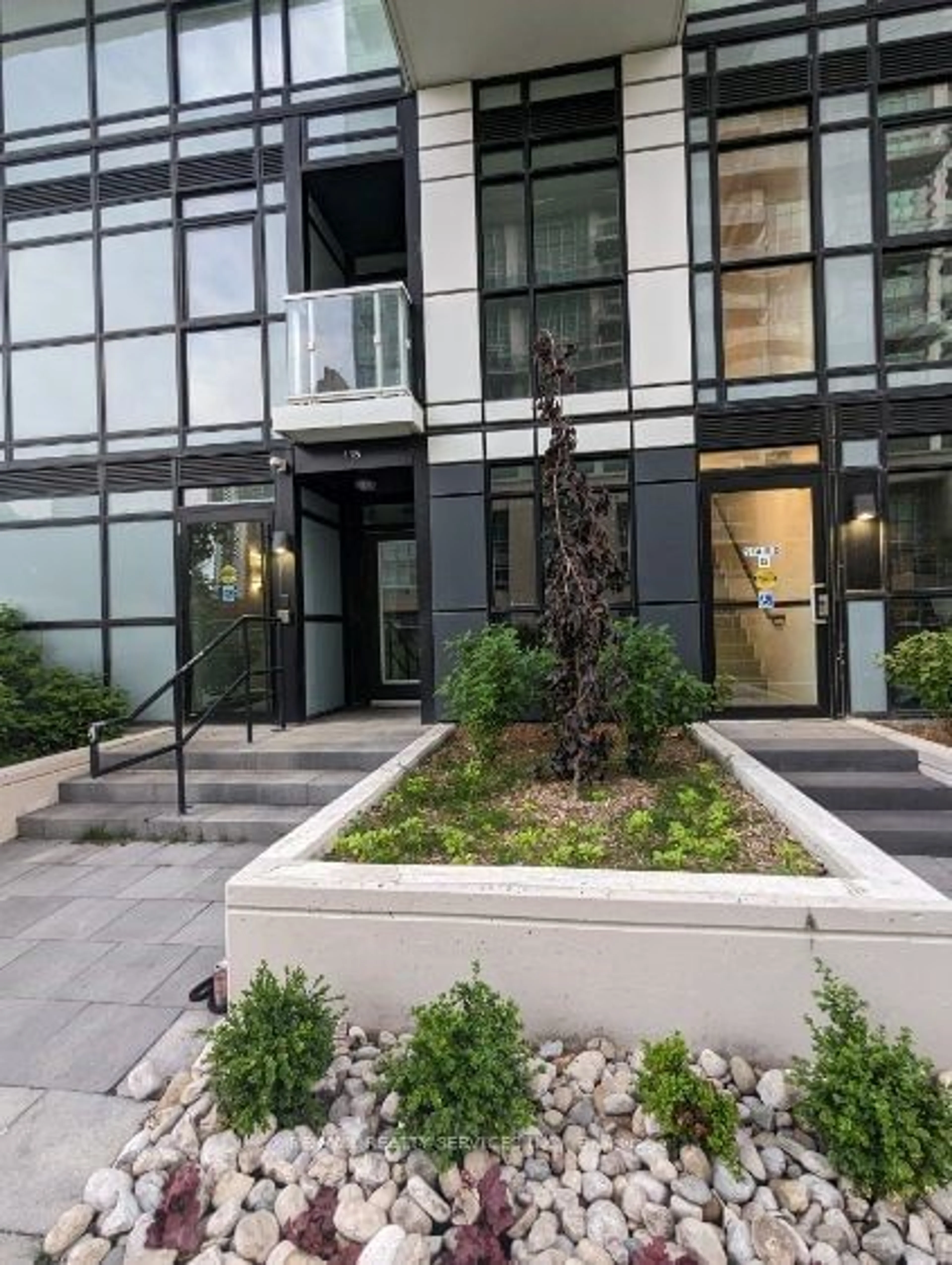 A pic from exterior of the house or condo for 251 Manitoba St #115, Toronto Ontario M8Y 0A7