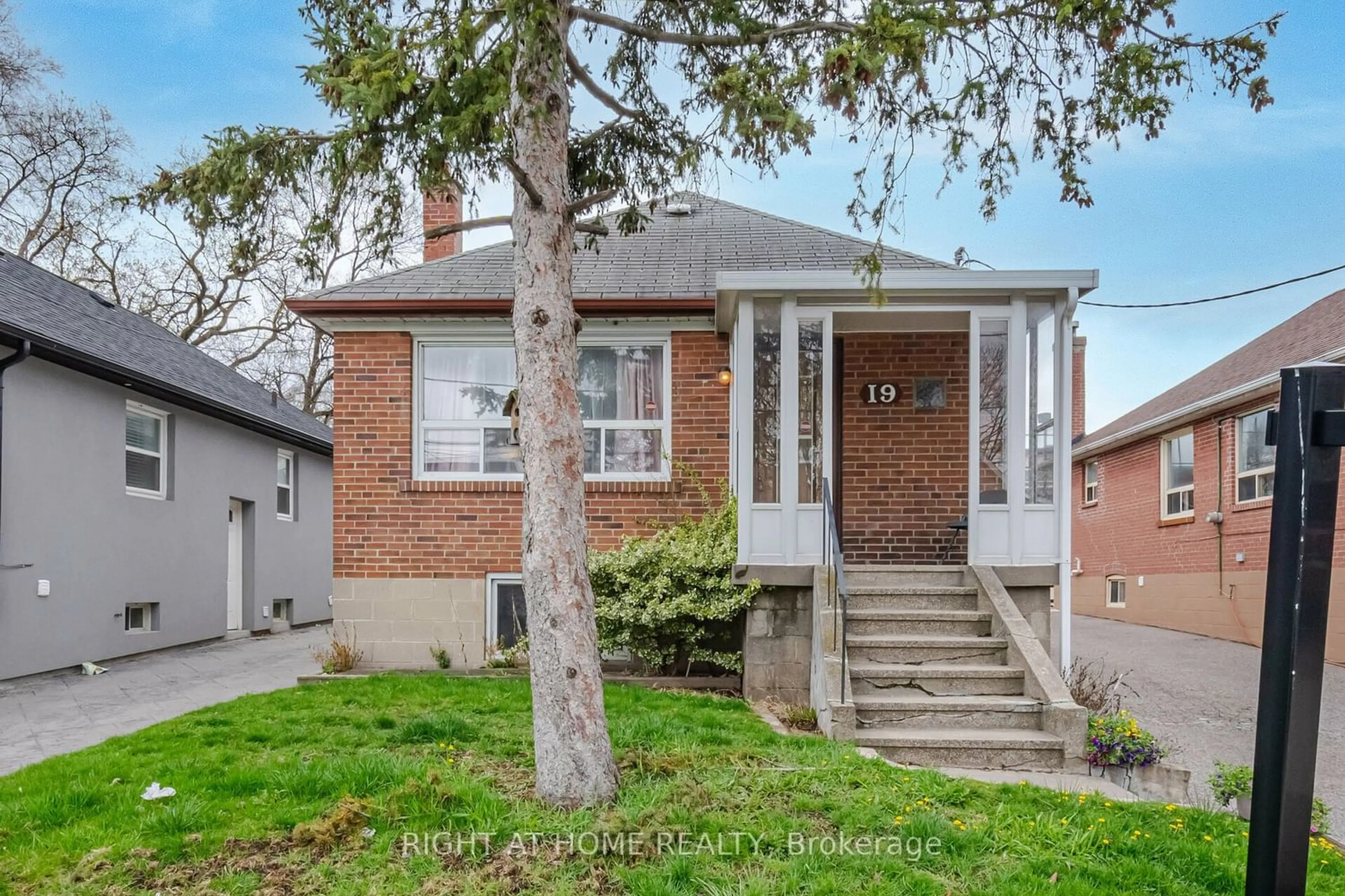 Frontside or backside of a home for 19 Hillary Ave, Toronto Ontario M6N 2B9