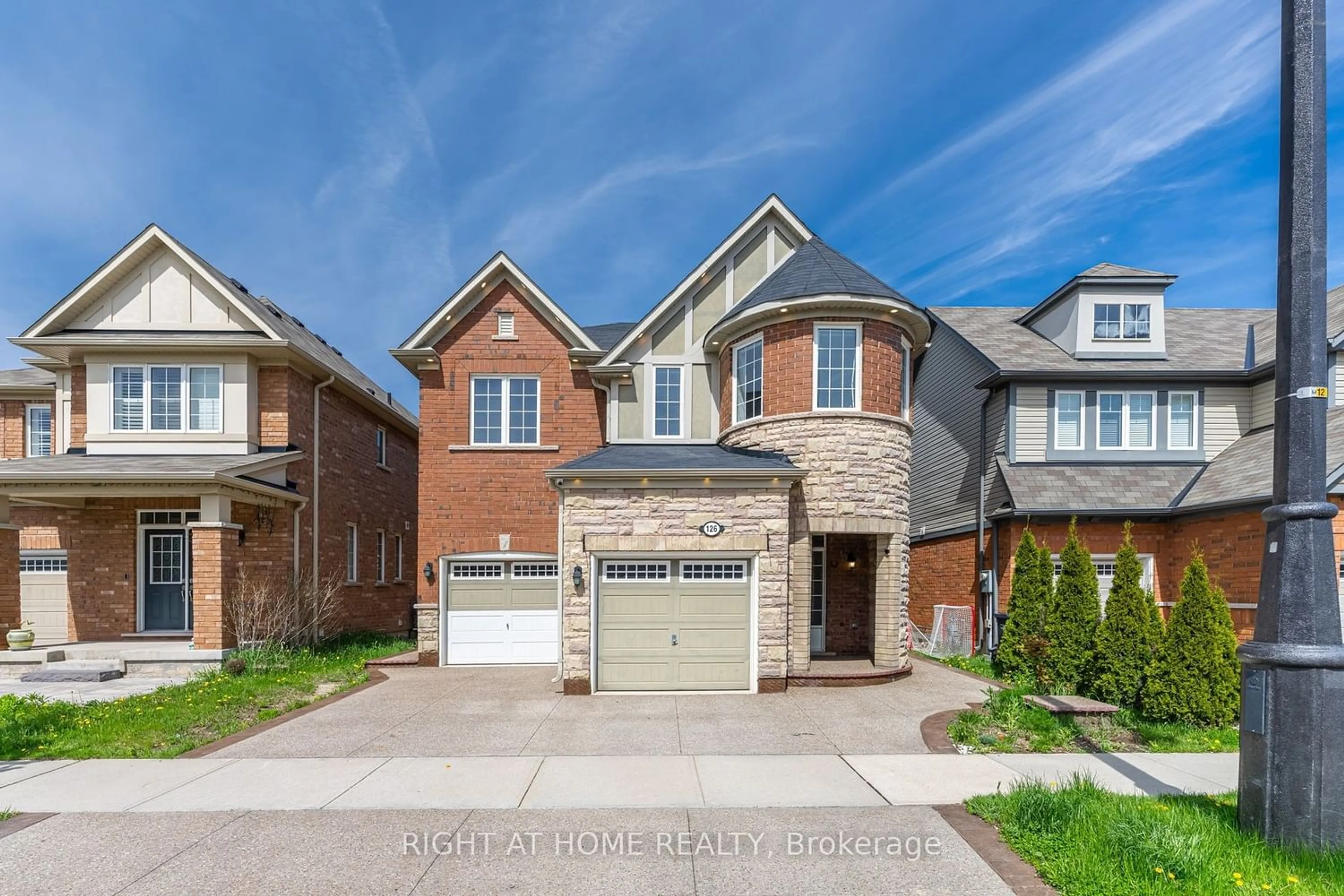 Home with brick exterior material for 126 Miracle Tr, Brampton Ontario L7A 0Y8