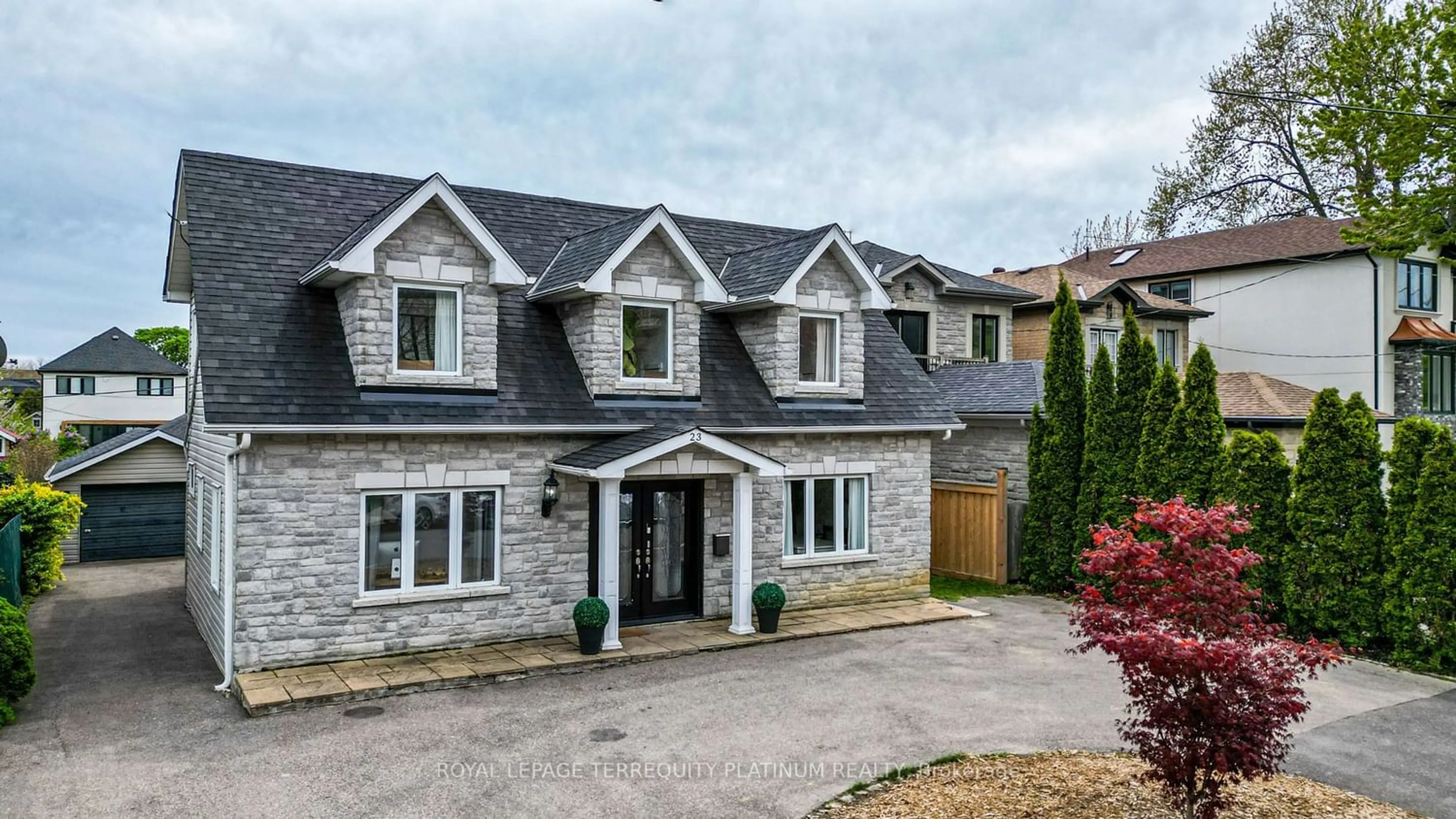 Home with brick exterior material for 23 Carnation Ave, Toronto Ontario M8V 2J8