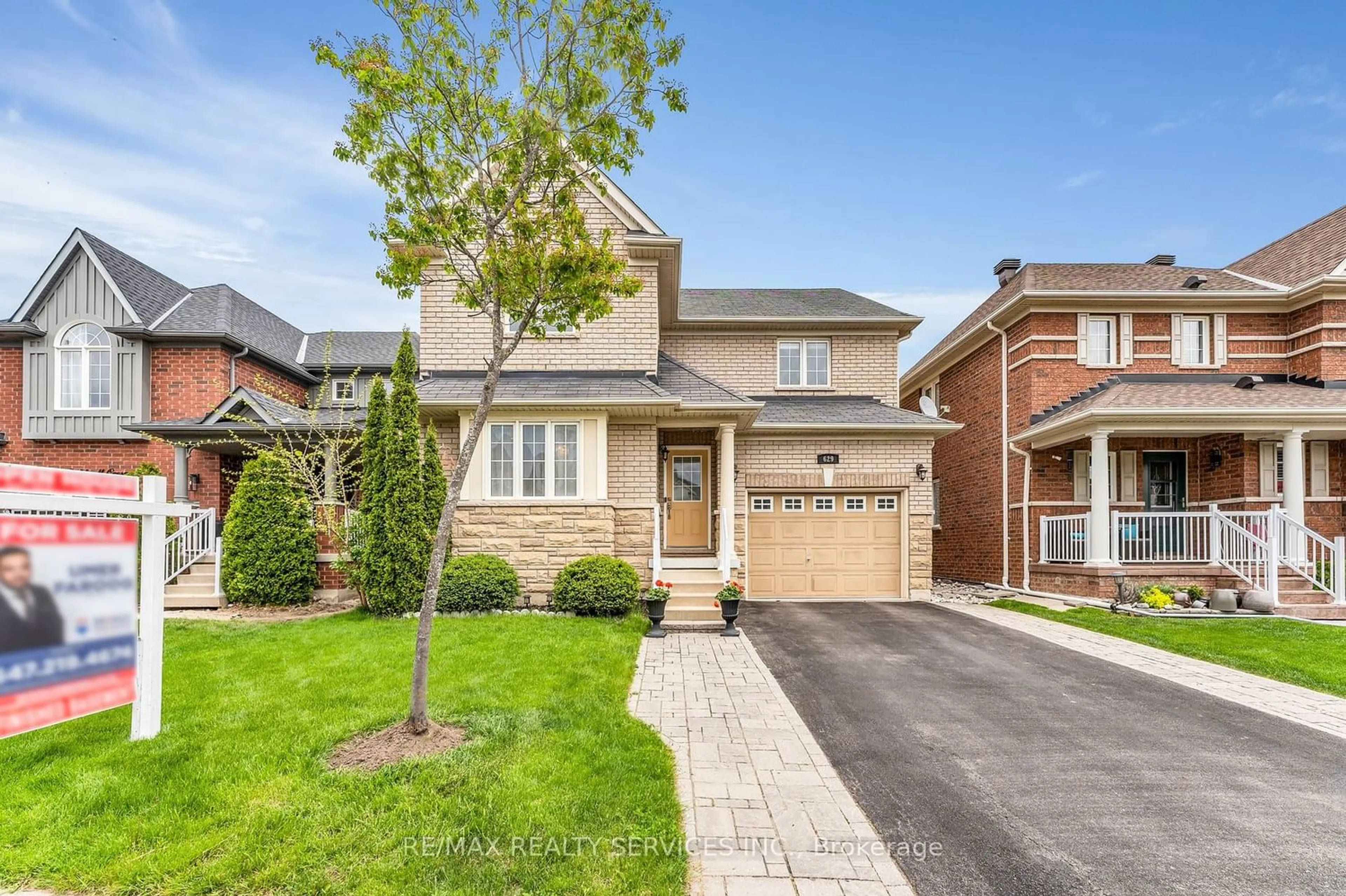 Frontside or backside of a home for 629 Caldwell Cres, Milton Ontario L9T 0H4