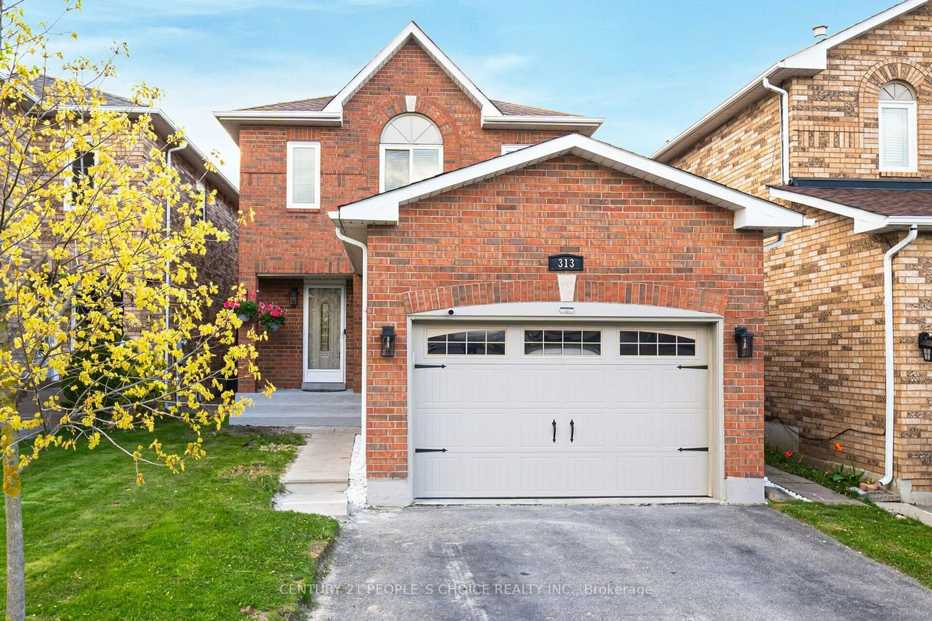 Home with brick exterior material for 313 Marshall Cres, Orangeville Ontario L9W 4Y5