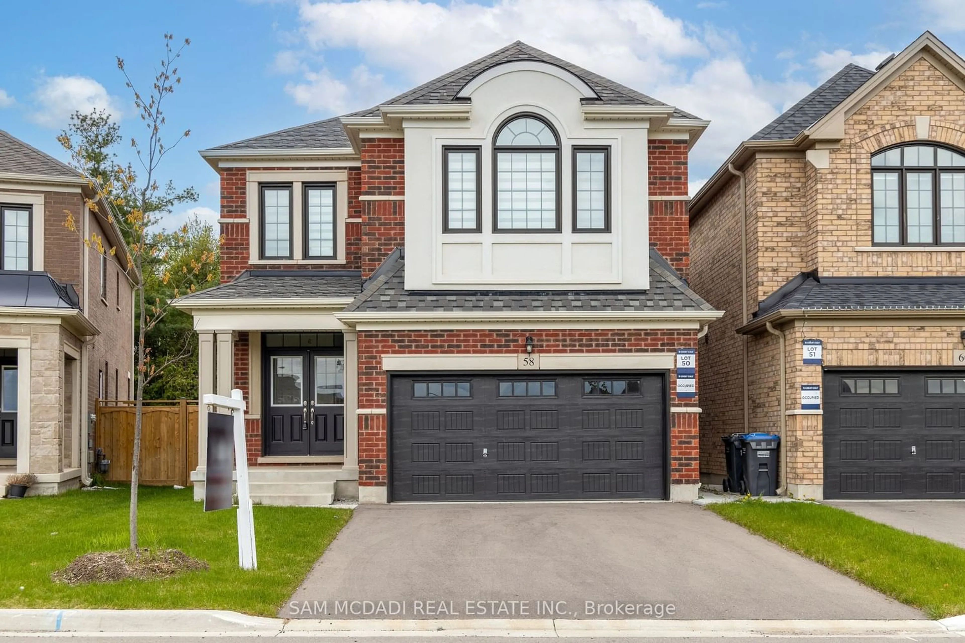 Home with brick exterior material for 58 Workgreen Park Way, Brampton Ontario L6Y 6J7