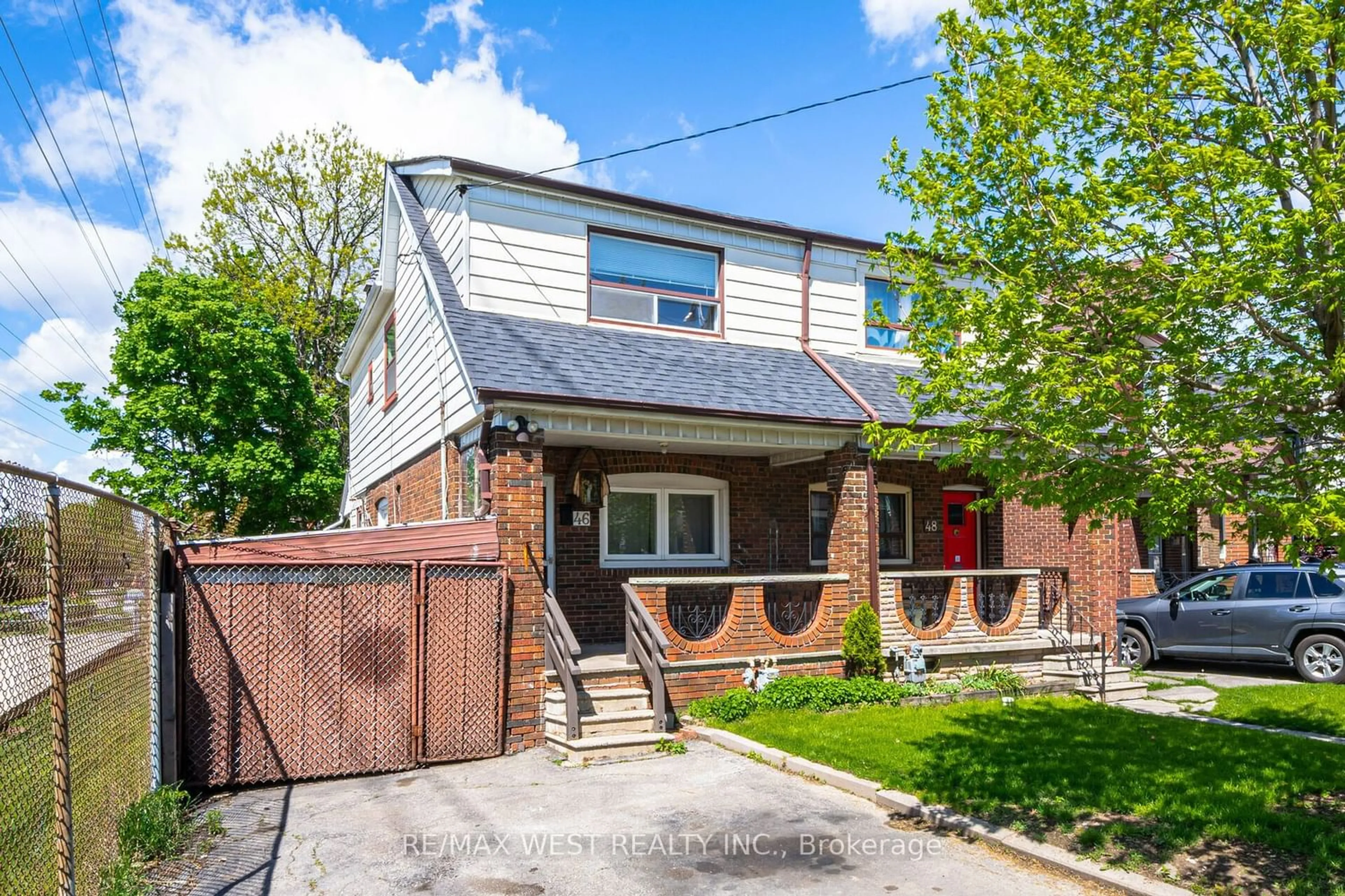Frontside or backside of a home for 46 Carrick Ave, Toronto Ontario M6N 3J5
