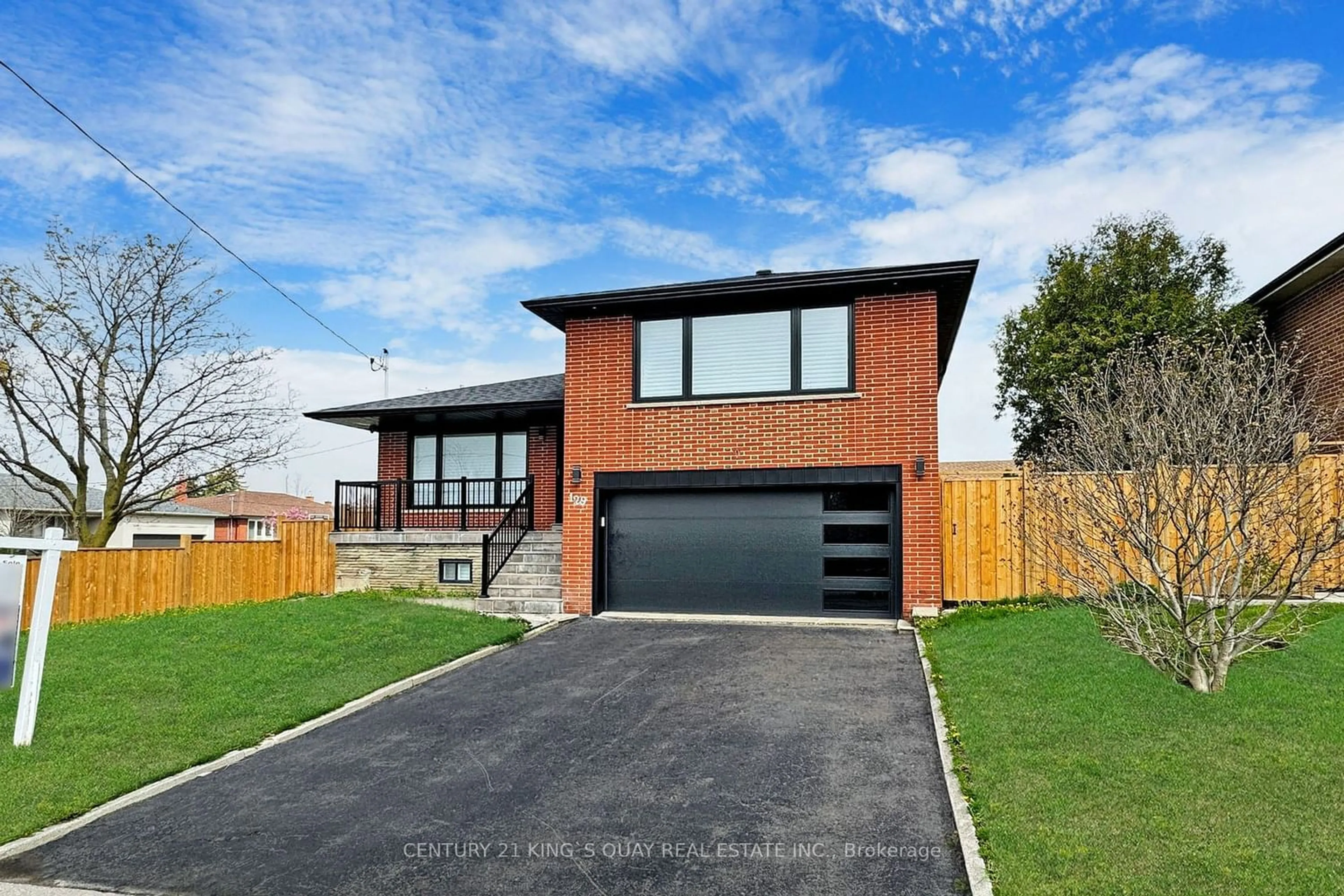 Home with brick exterior material for 129 Exbury Rd, Toronto Ontario M3M 1R5