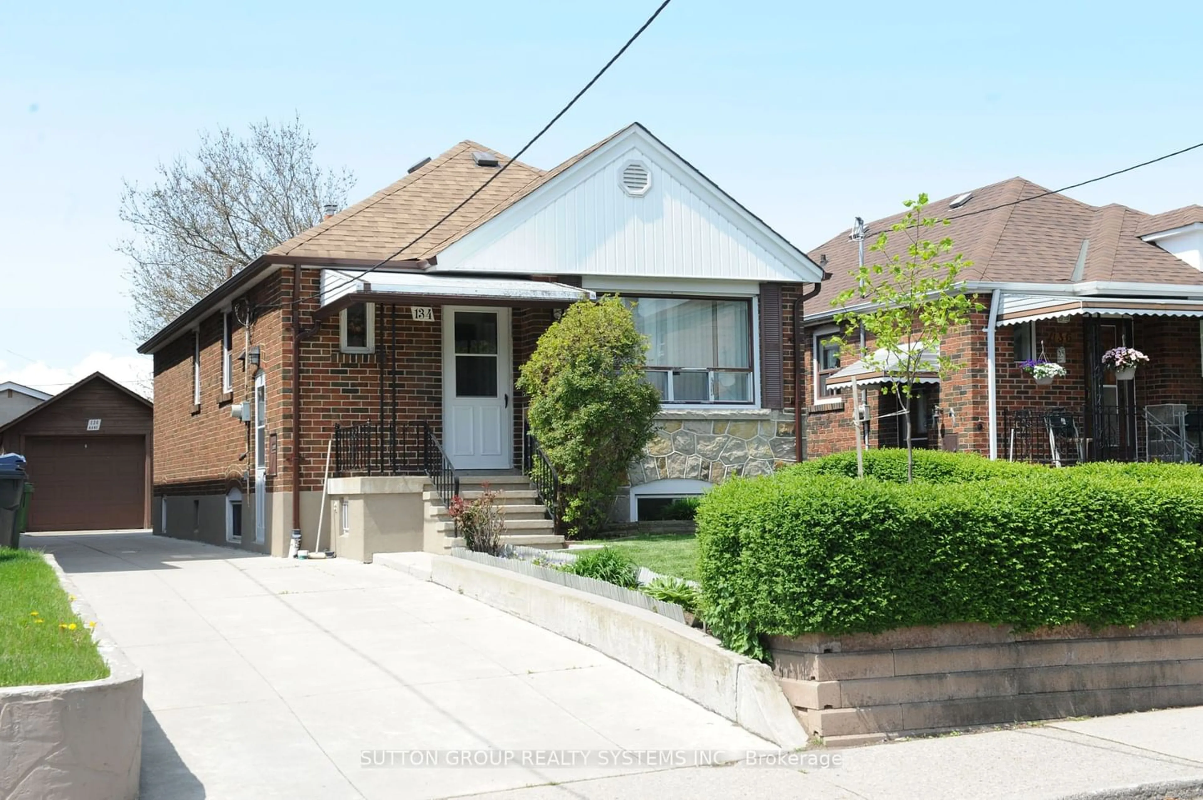 Frontside or backside of a home for 134 Kane Ave, Toronto Ontario M6M 3N2