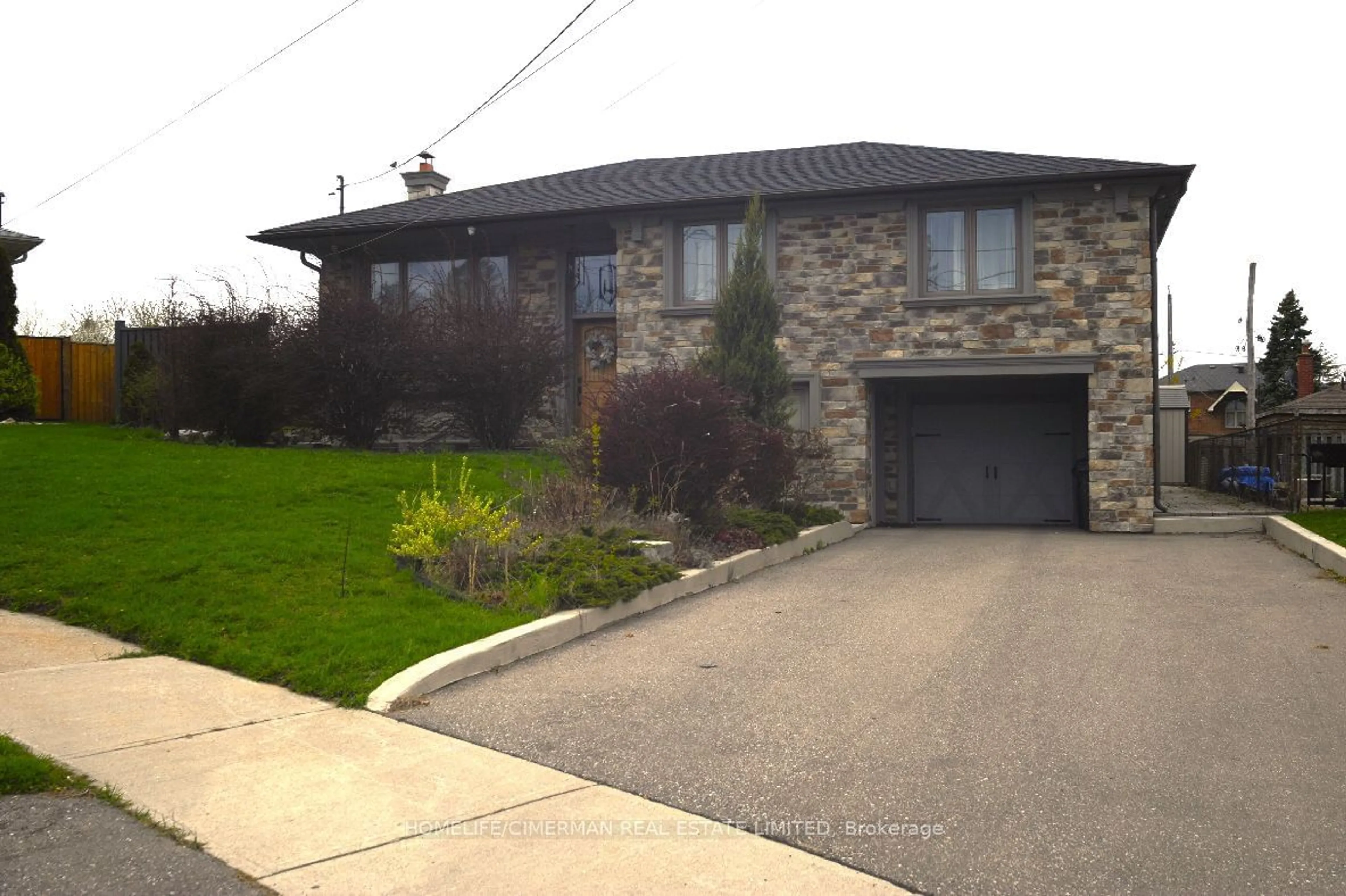 Frontside or backside of a home for 49 Mangrove Rd, Toronto Ontario M6L 2A4