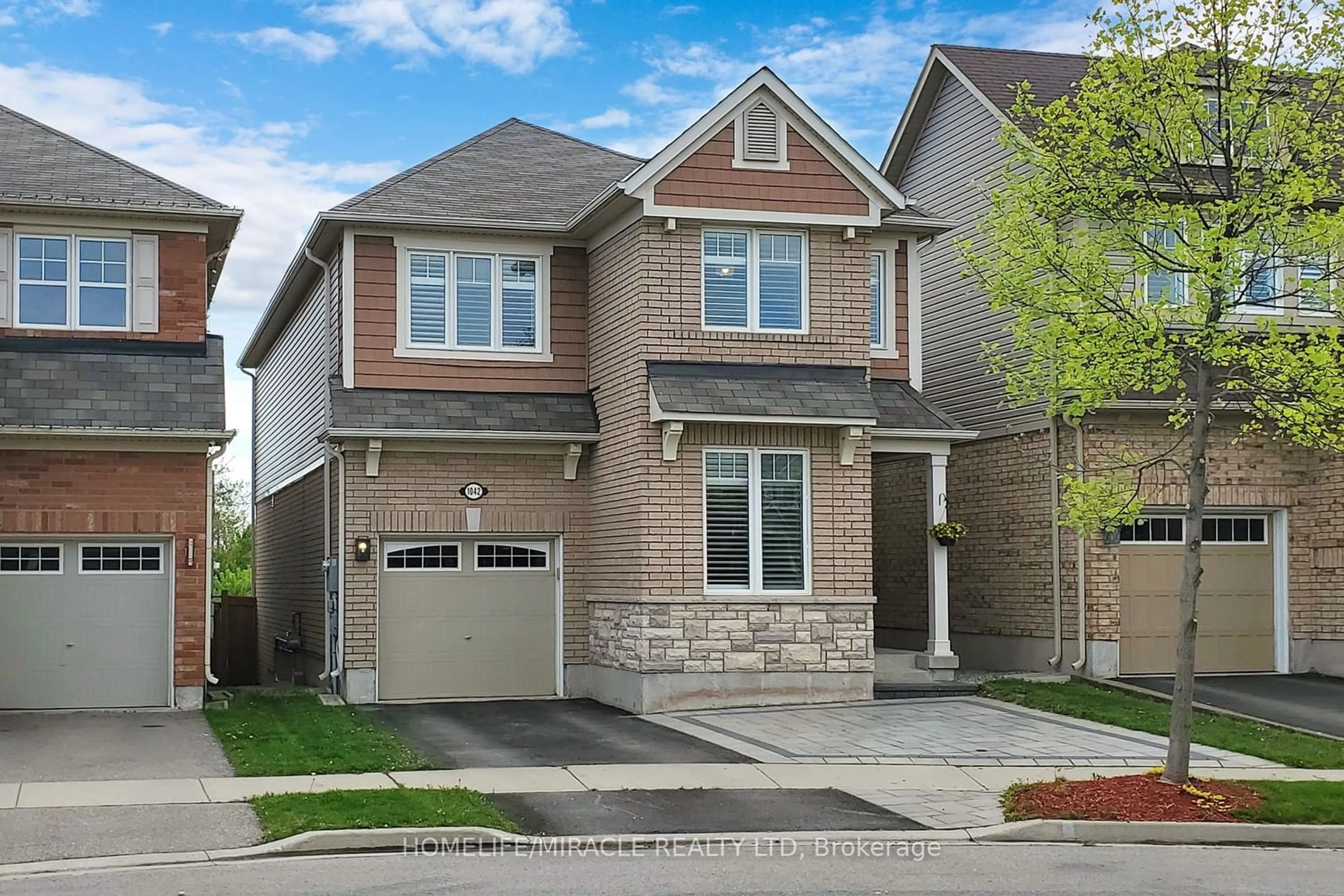 Home with brick exterior material for 1042 Tock Clse, Milton Ontario L9T 8G8