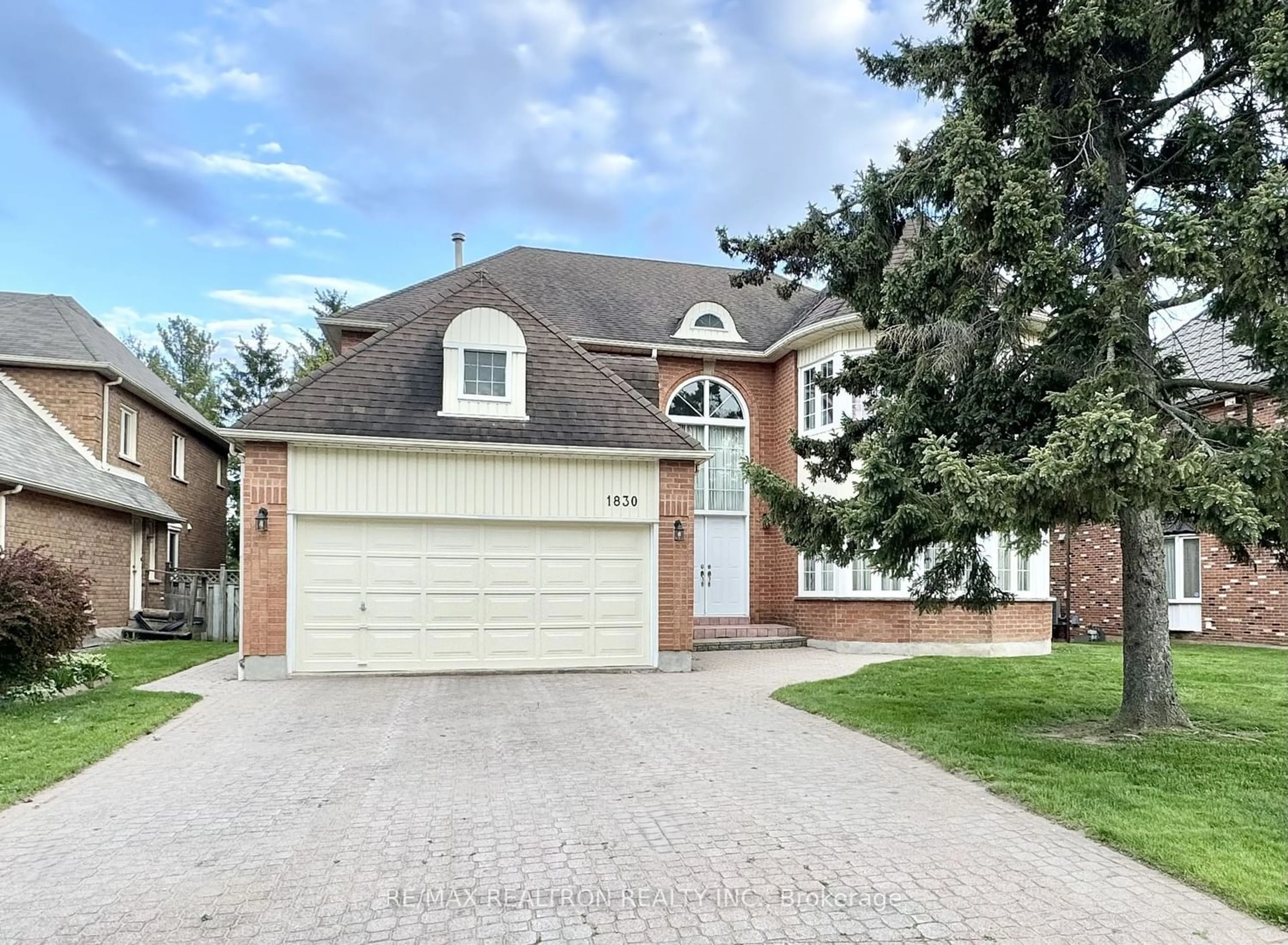 Home with brick exterior material for 1830 Sevenoaks Dr, Mississauga Ontario L5K 2N5