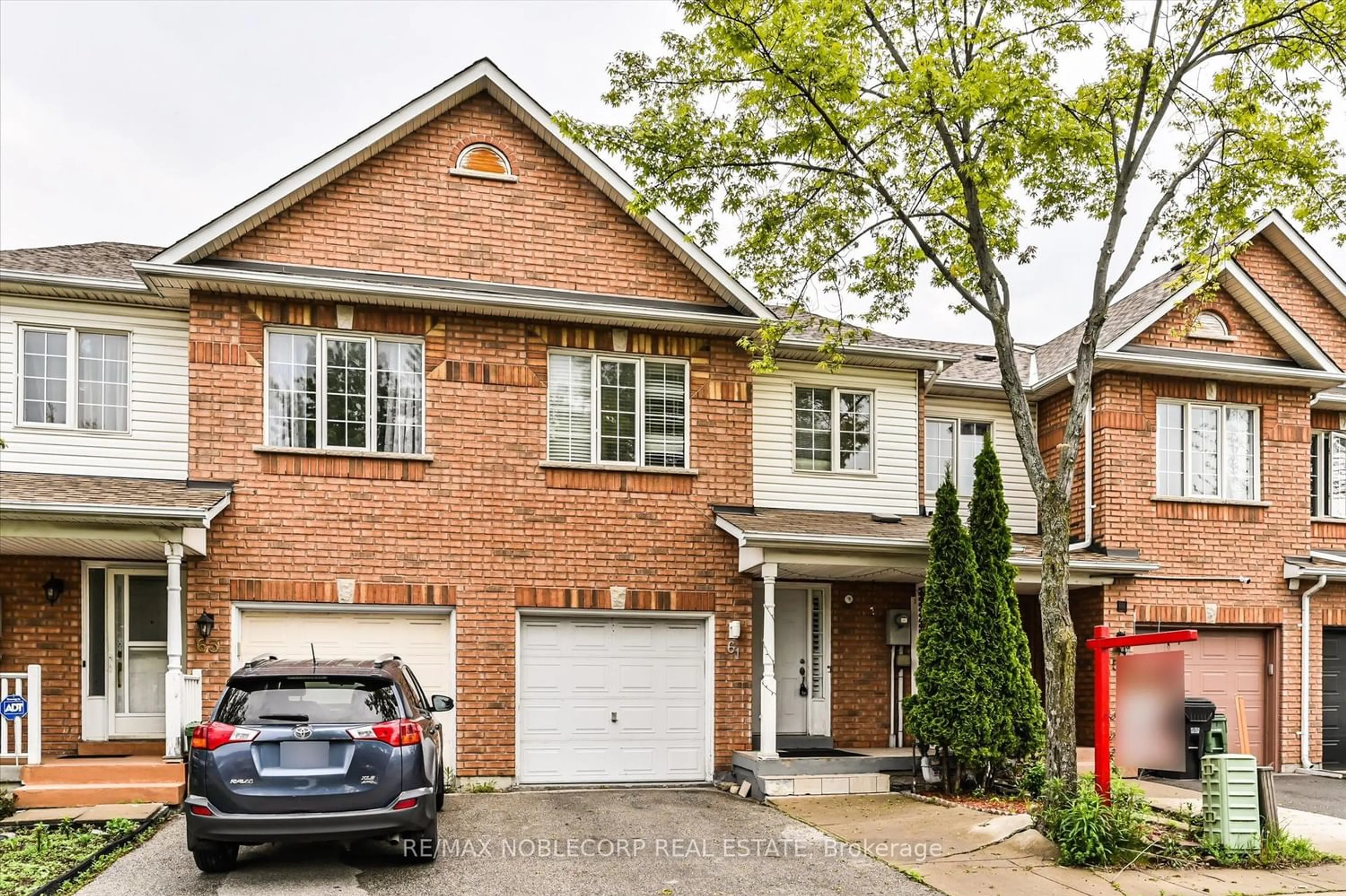 Home with brick exterior material for 61 Triple Crown Ave, Toronto Ontario M9W 7E3