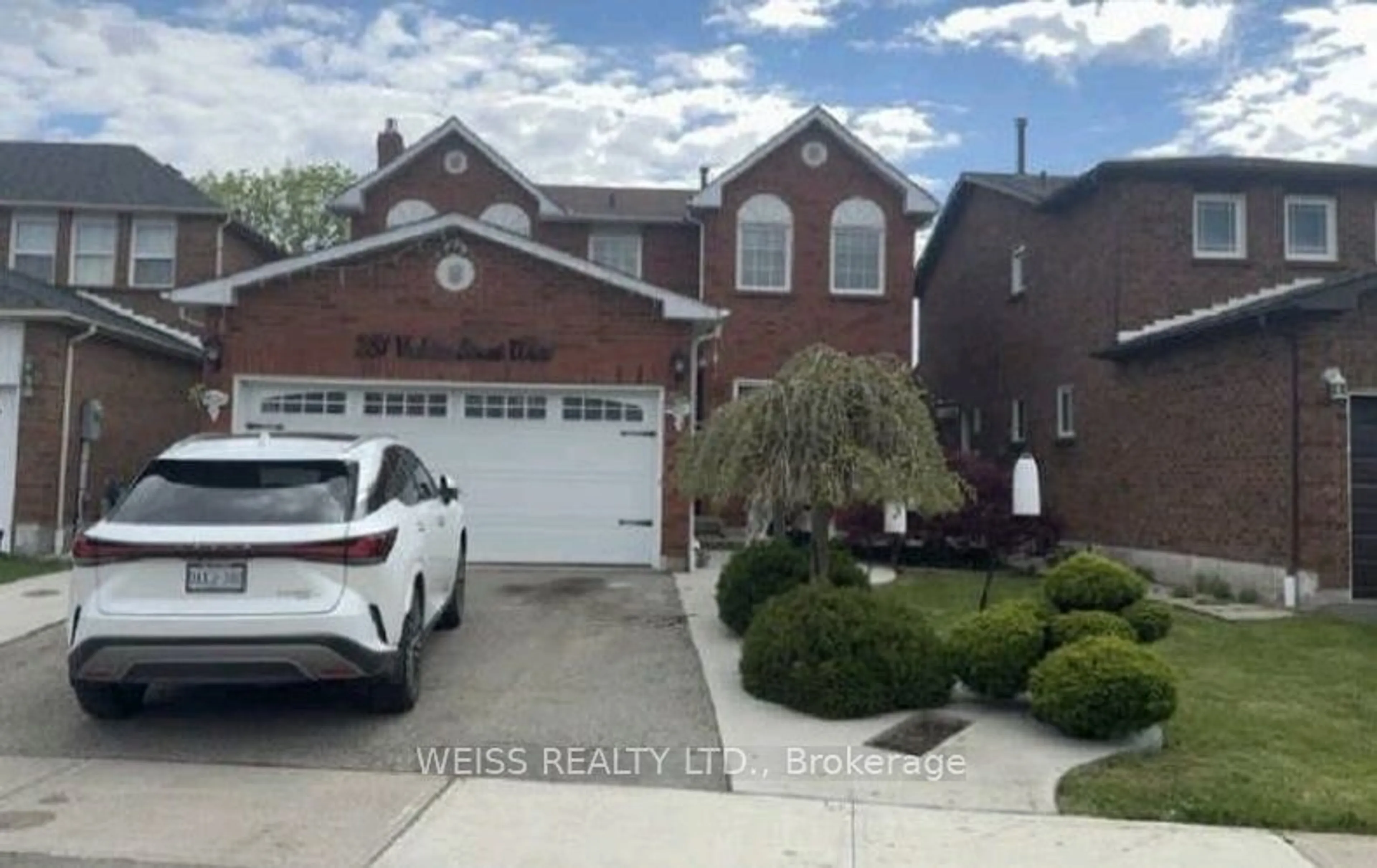 Frontside or backside of a home for 251 Vodden St, Brampton Ontario L6X 2X7