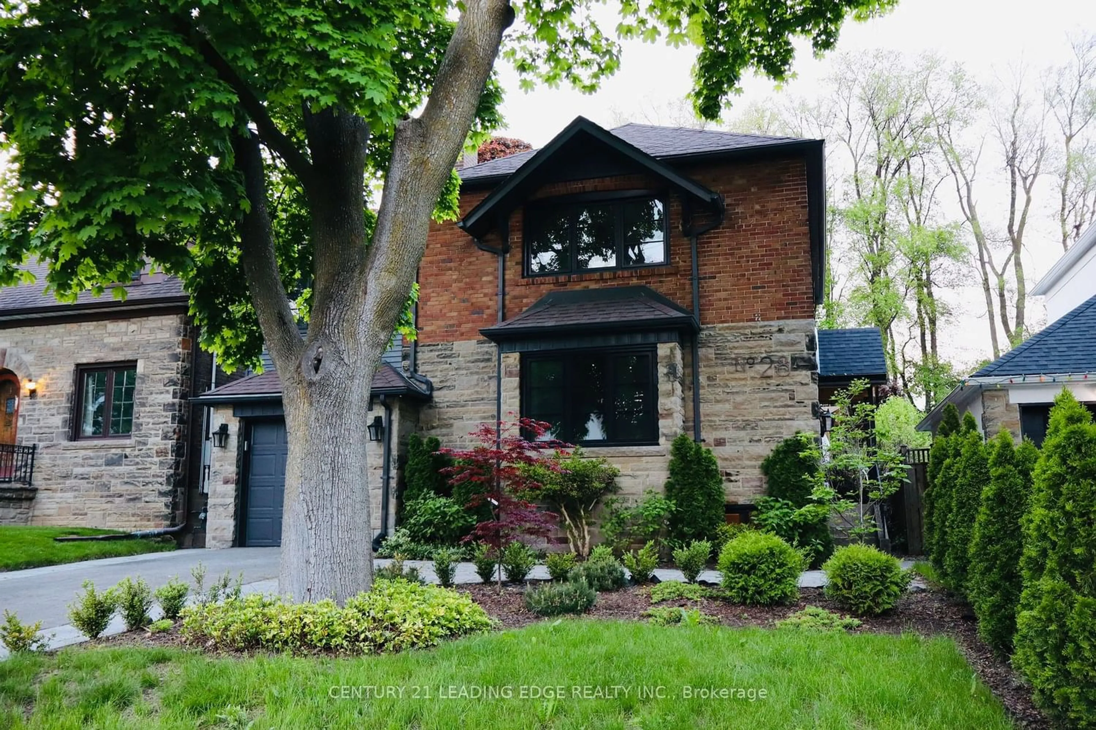 Home with brick exterior material for 28 Glenaden Ave, Toronto Ontario M8Y 2L3