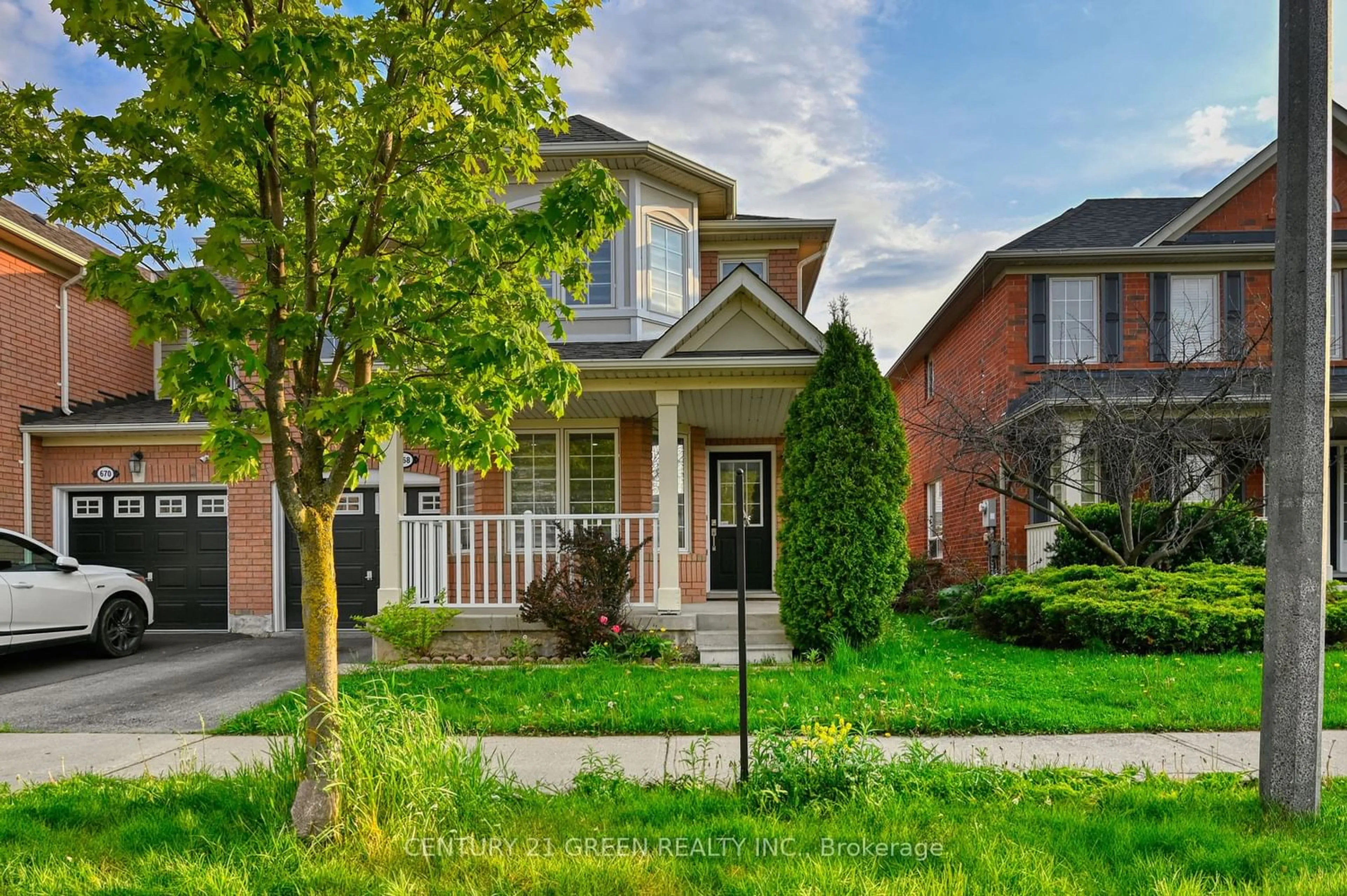 Frontside or backside of a home for 668 Hamilton Cres, Milton Ontario L9T 6H1