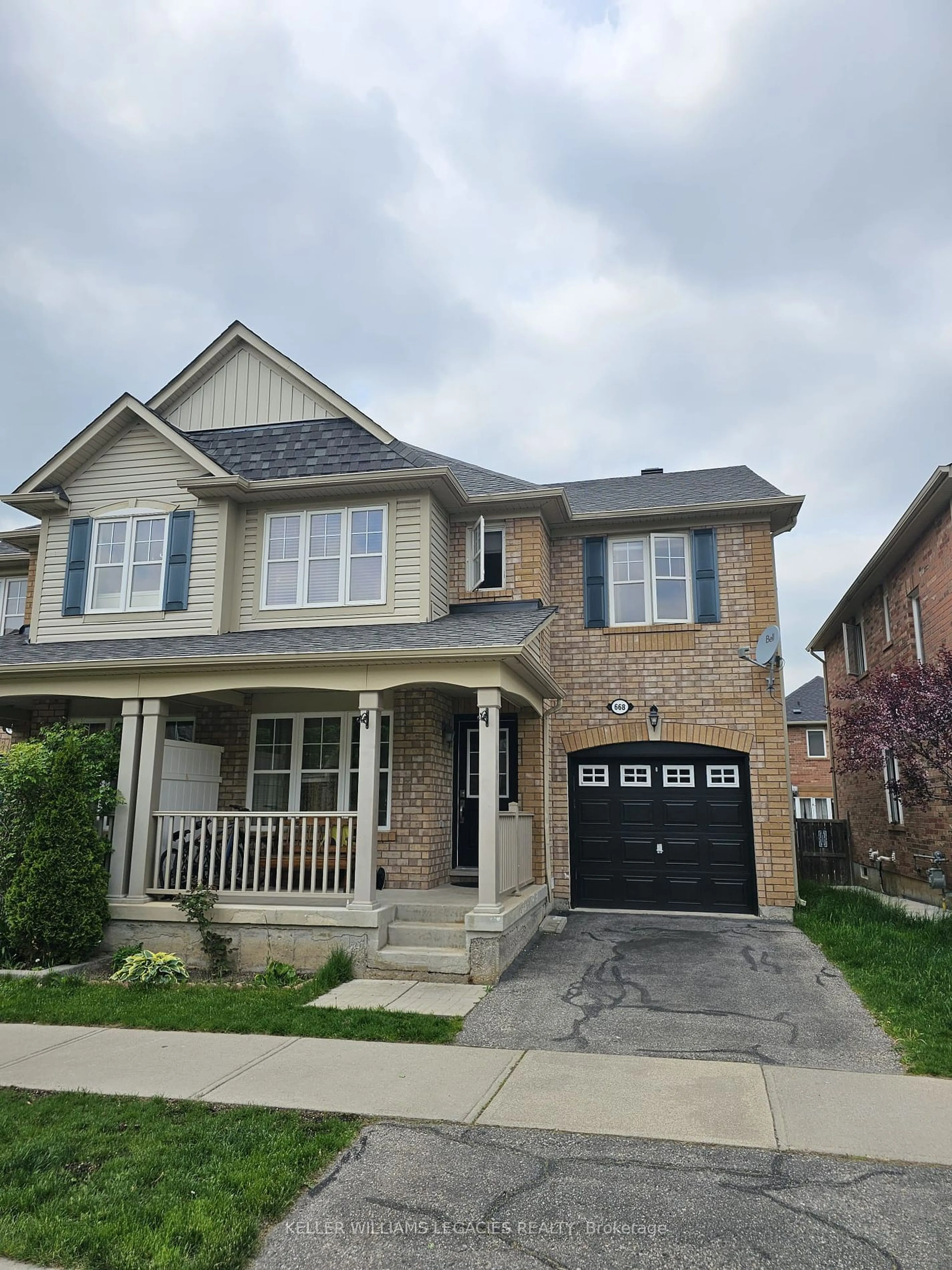 Home with brick exterior material for 668 Speyer Circ, Milton Ontario L9T 0Y6