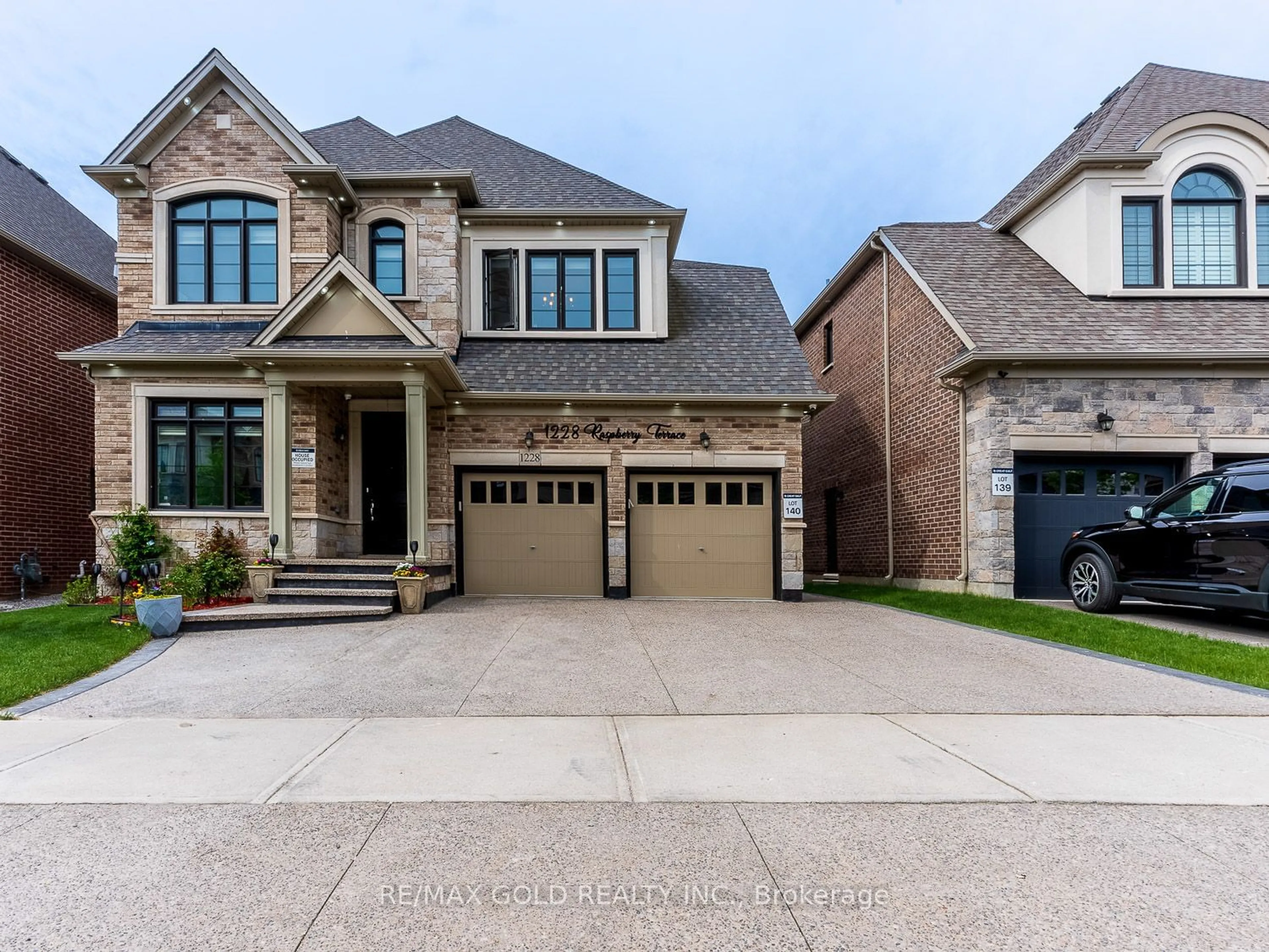 Home with brick exterior material for 1228 Raspberry Terr, Milton Ontario L9E 1N1