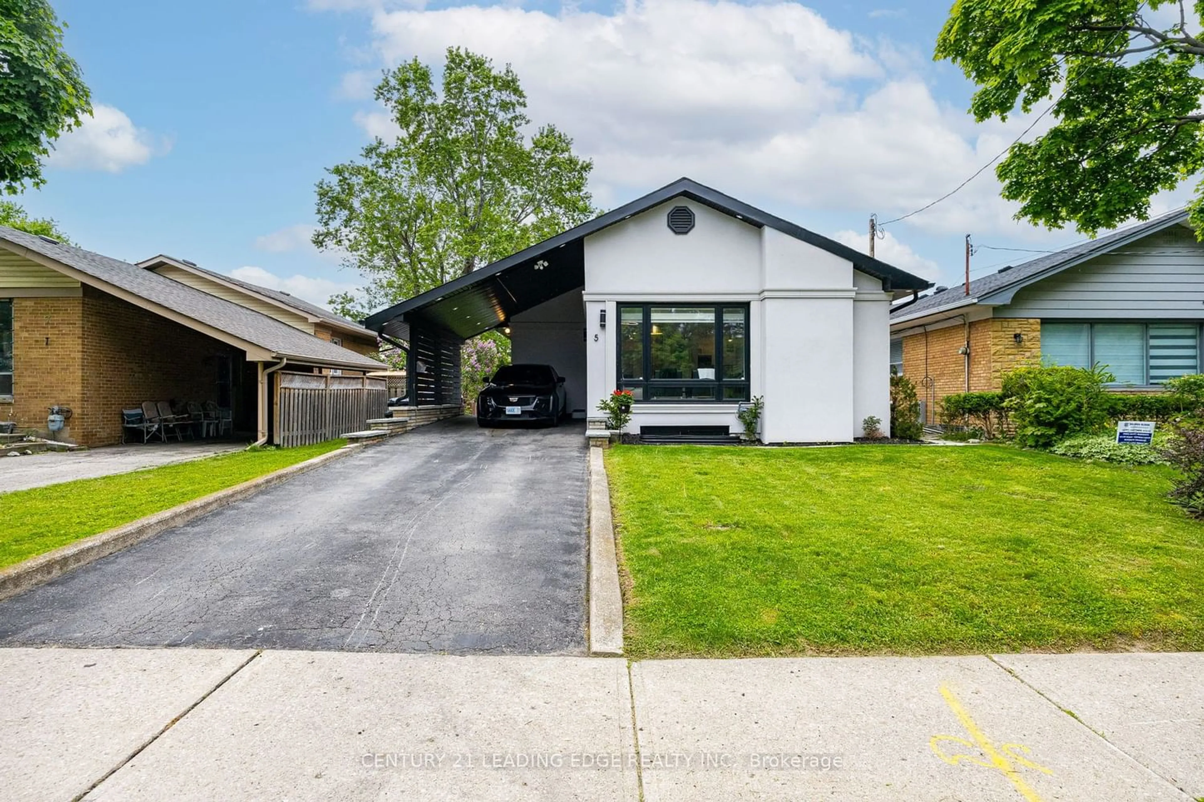 Frontside or backside of a home for 5 Westhampton Dr, Toronto Ontario M9R 1X7
