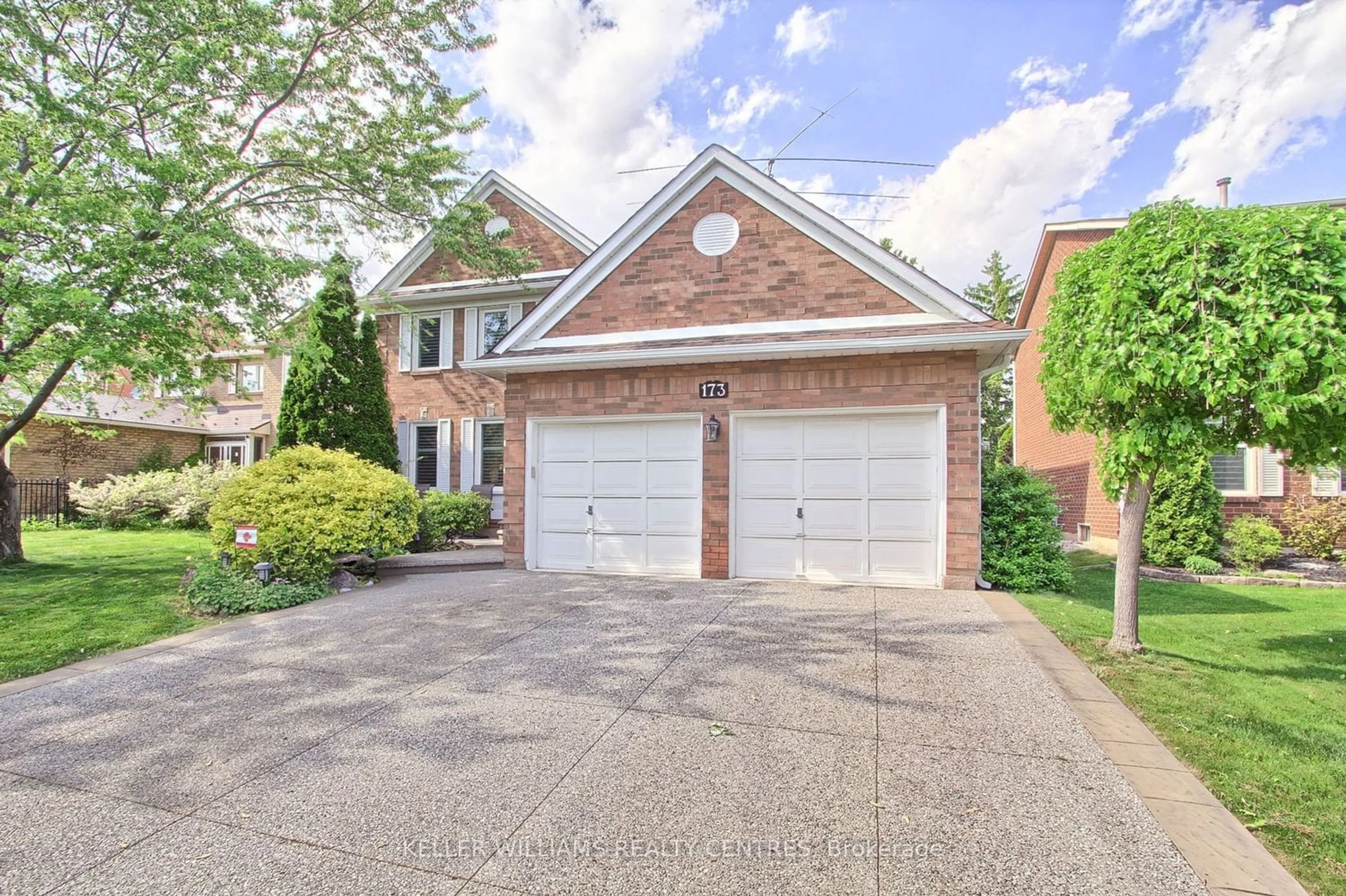 Home with brick exterior material for 173 River Oaks Blvd, Oakville Ontario L6H 3S7