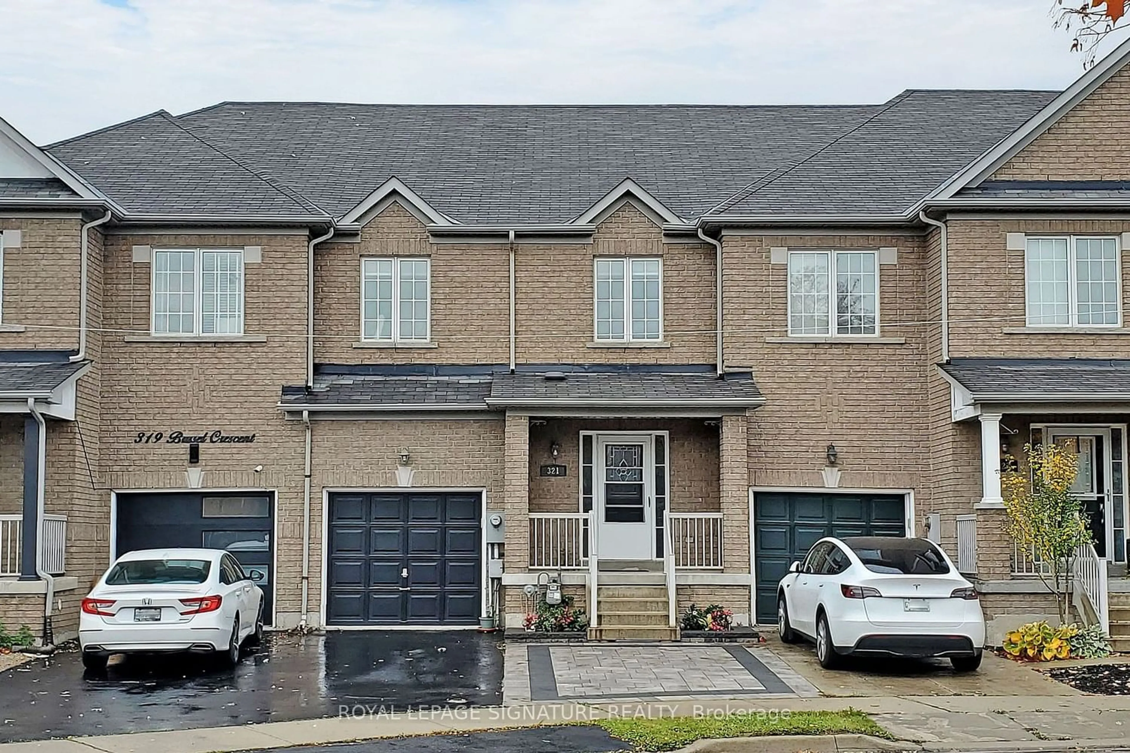 A pic from exterior of the house or condo for 321 Bussel Cres, Milton Ontario L9T 0W5