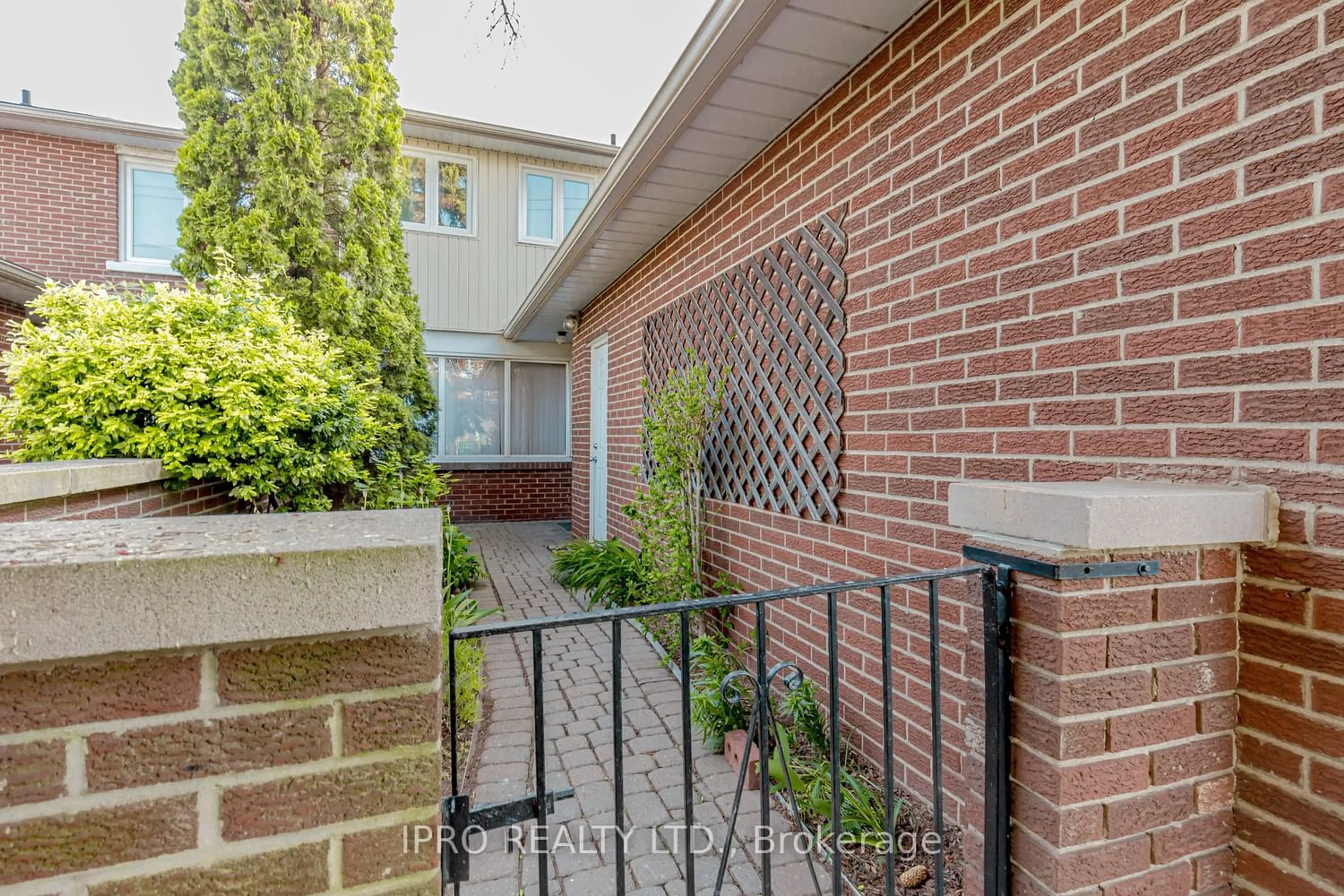 A pic from exterior of the house or condo, the fenced backyard for 150 Kenwood Ave, Burlington Ontario L7L 4L7