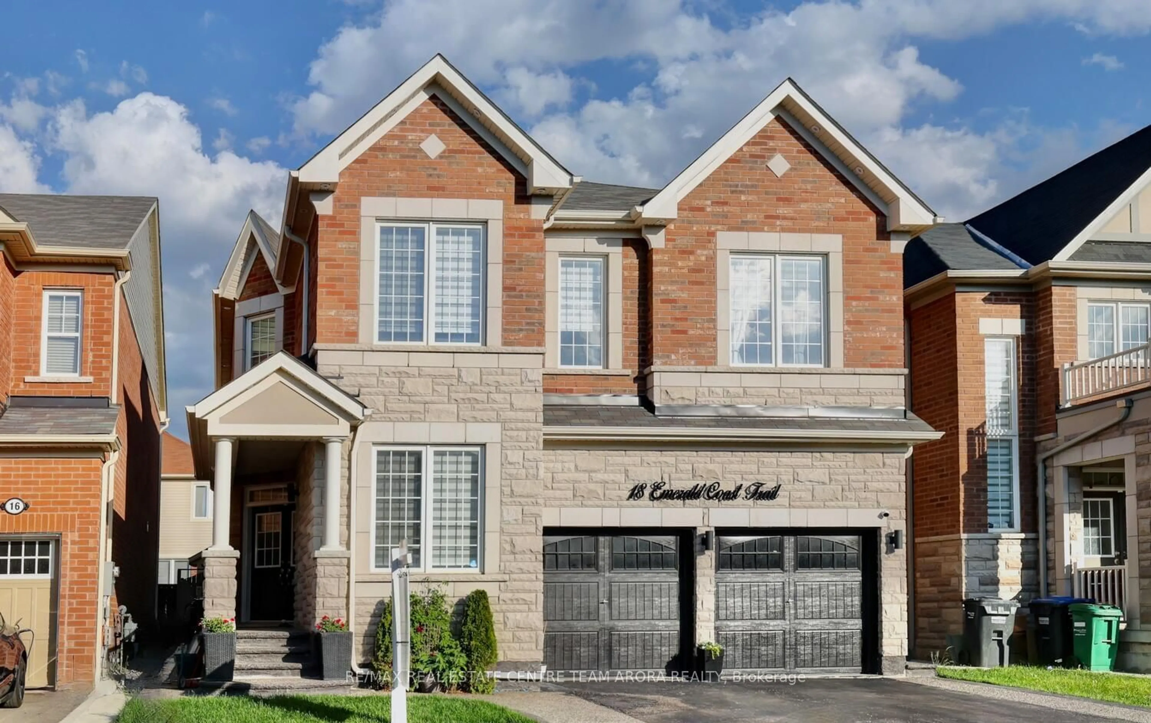 Home with brick exterior material for 18 Emerald Coast Tr, Brampton Ontario L7A 5A7