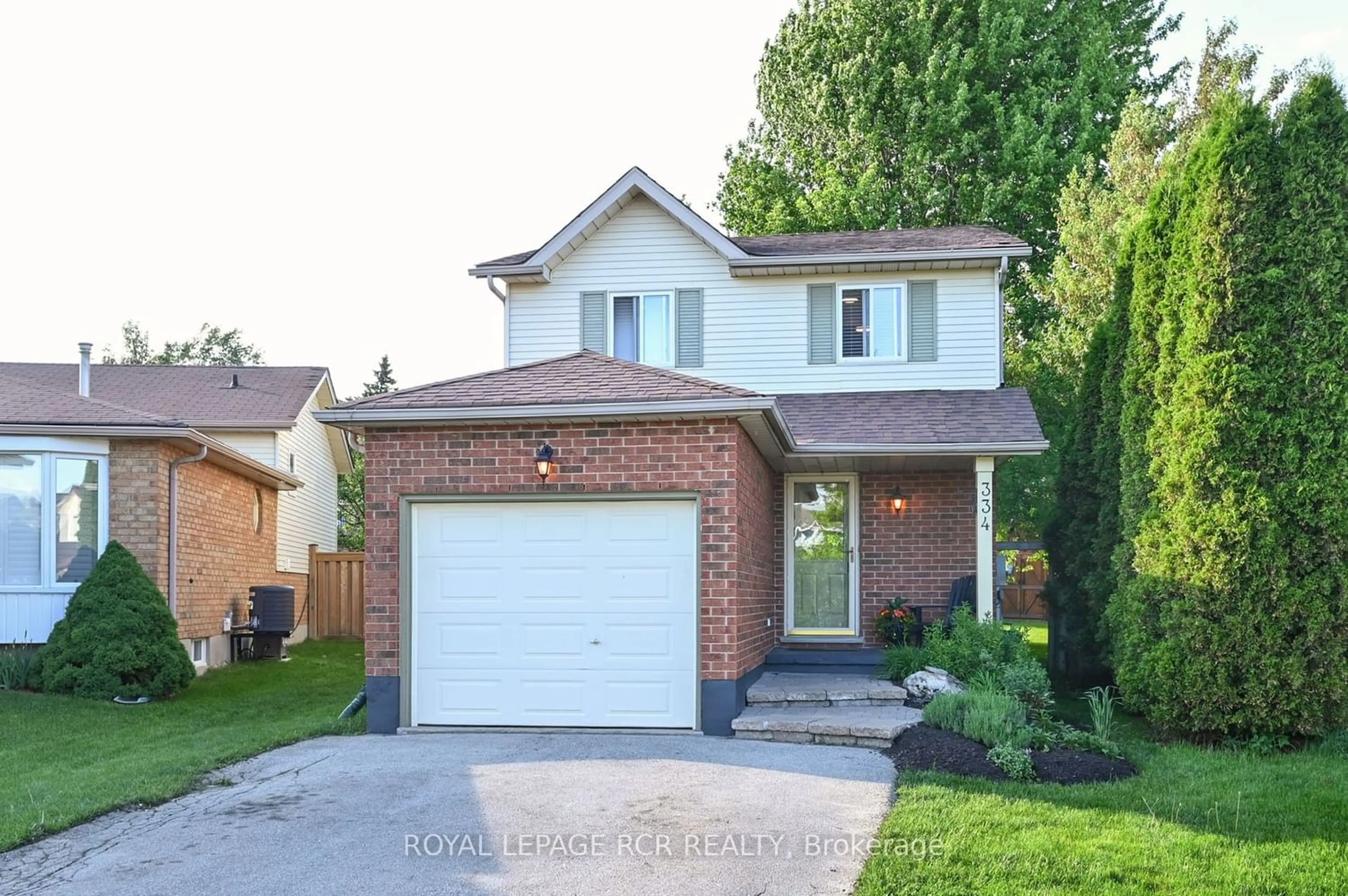 Home with brick exterior material for 334 Adams Crt, Orangeville Ontario L9W 4R7