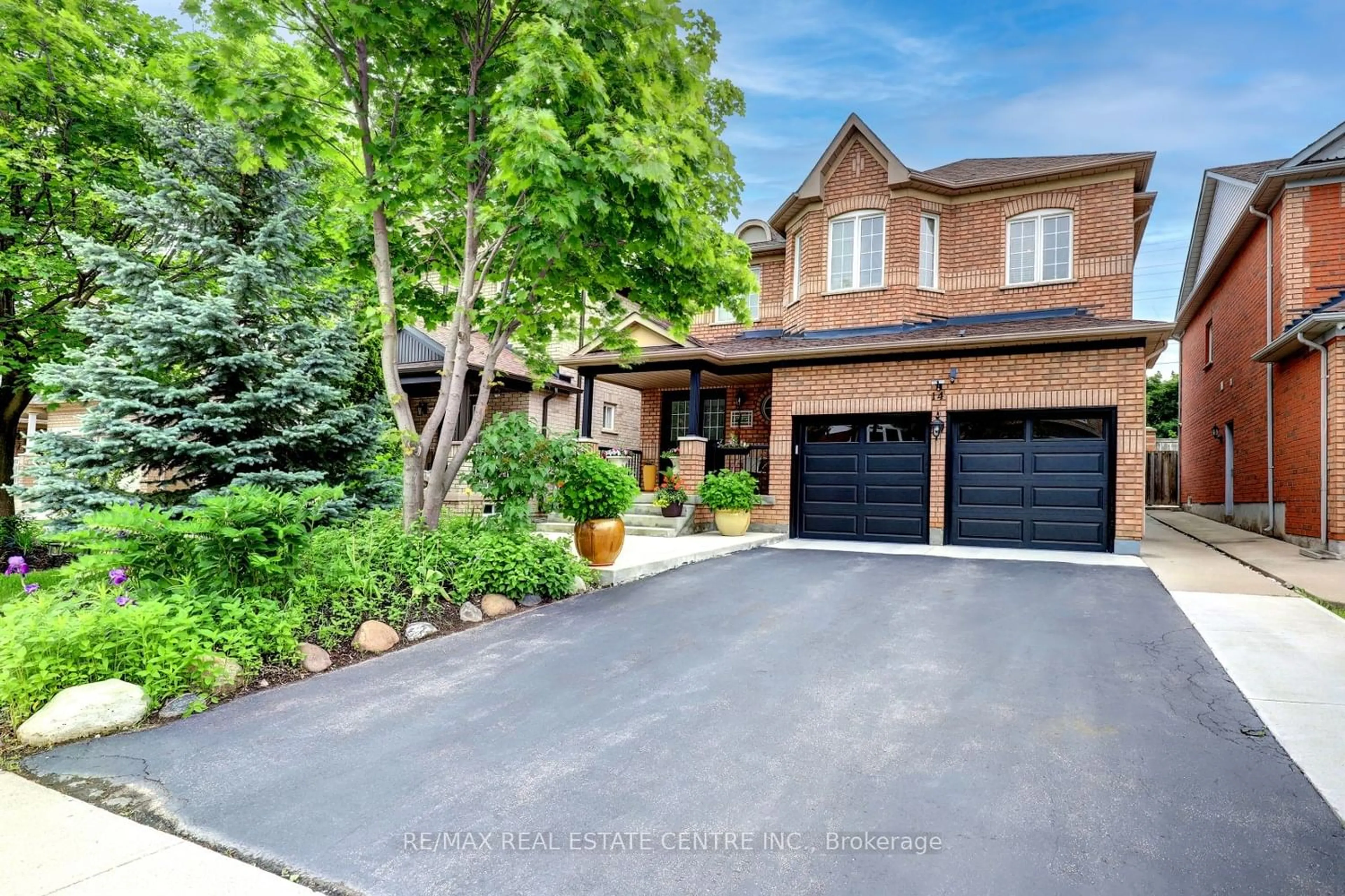 Home with brick exterior material for 14 Masters Green Cres, Brampton Ontario L7A 3K2