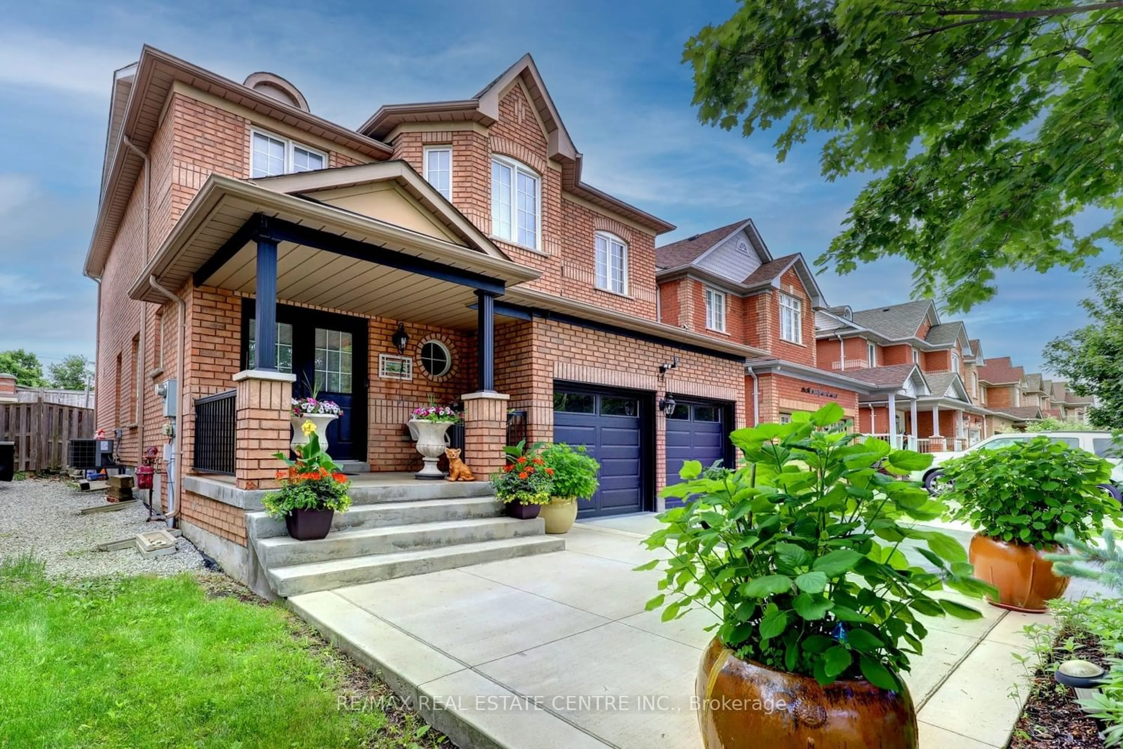 Home with brick exterior material for 14 Masters Green Cres, Brampton Ontario L7A 3K2