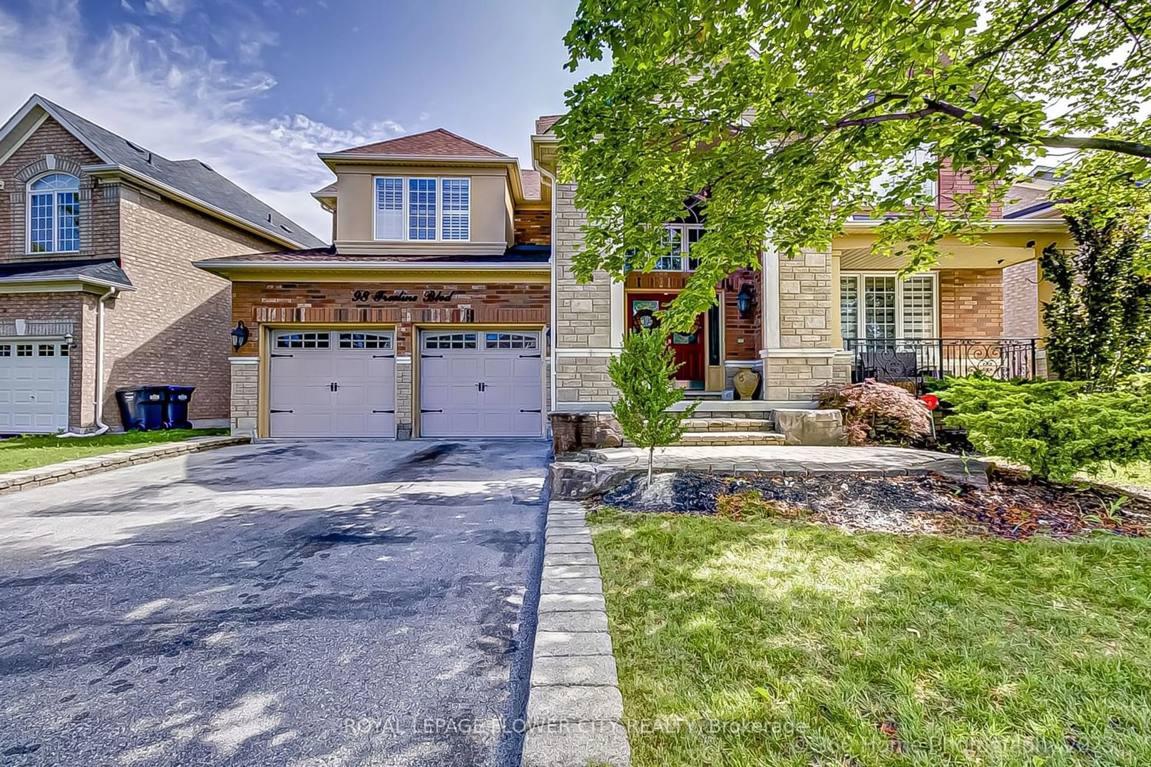 Home with brick exterior material for 98 Treeline Blvd, Brampton Ontario L6P 1A2