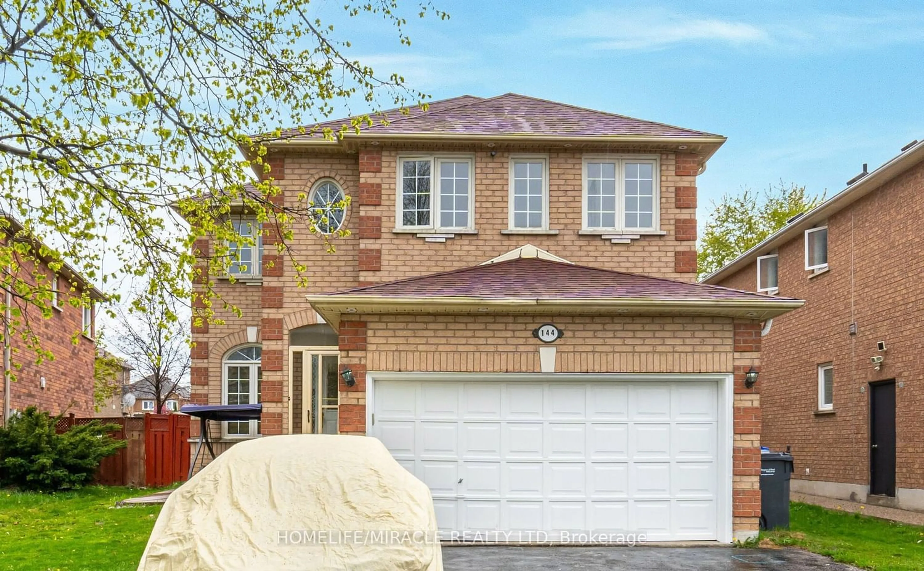 Home with brick exterior material for 144 Lockwood Rd, Brampton Ontario L6Y 4Z2