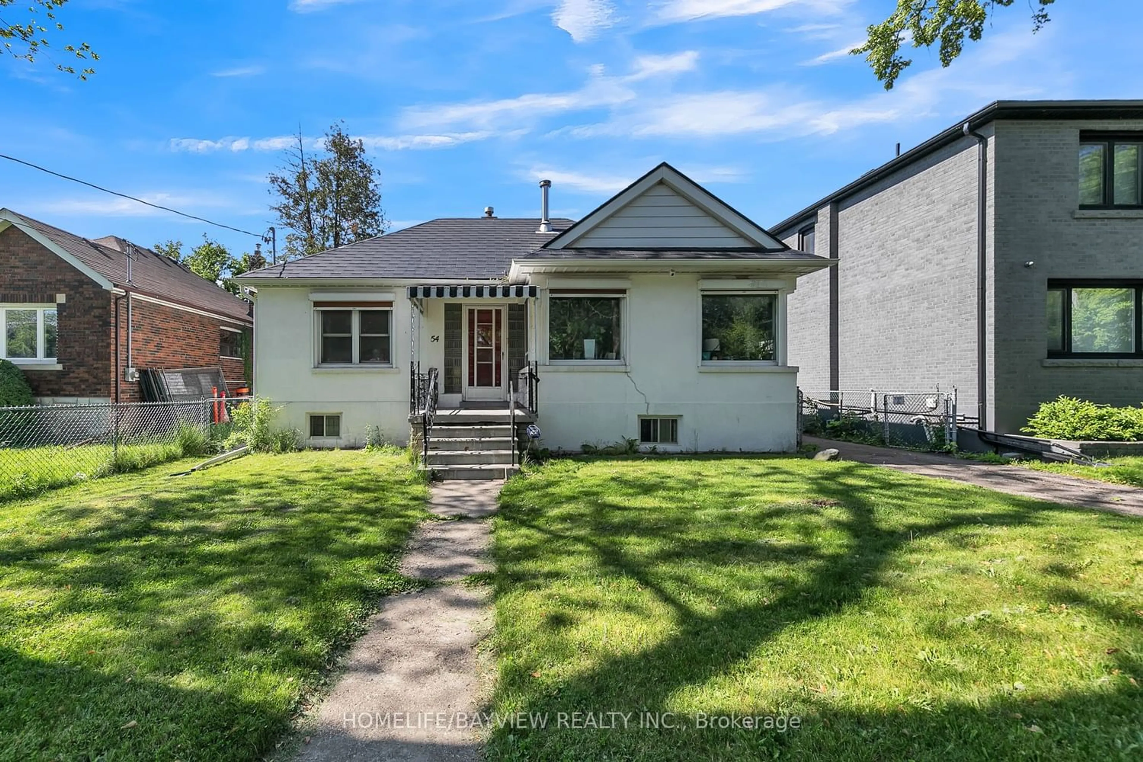 Frontside or backside of a home for 54 Ash Cres, Toronto Ontario M8W 1E6