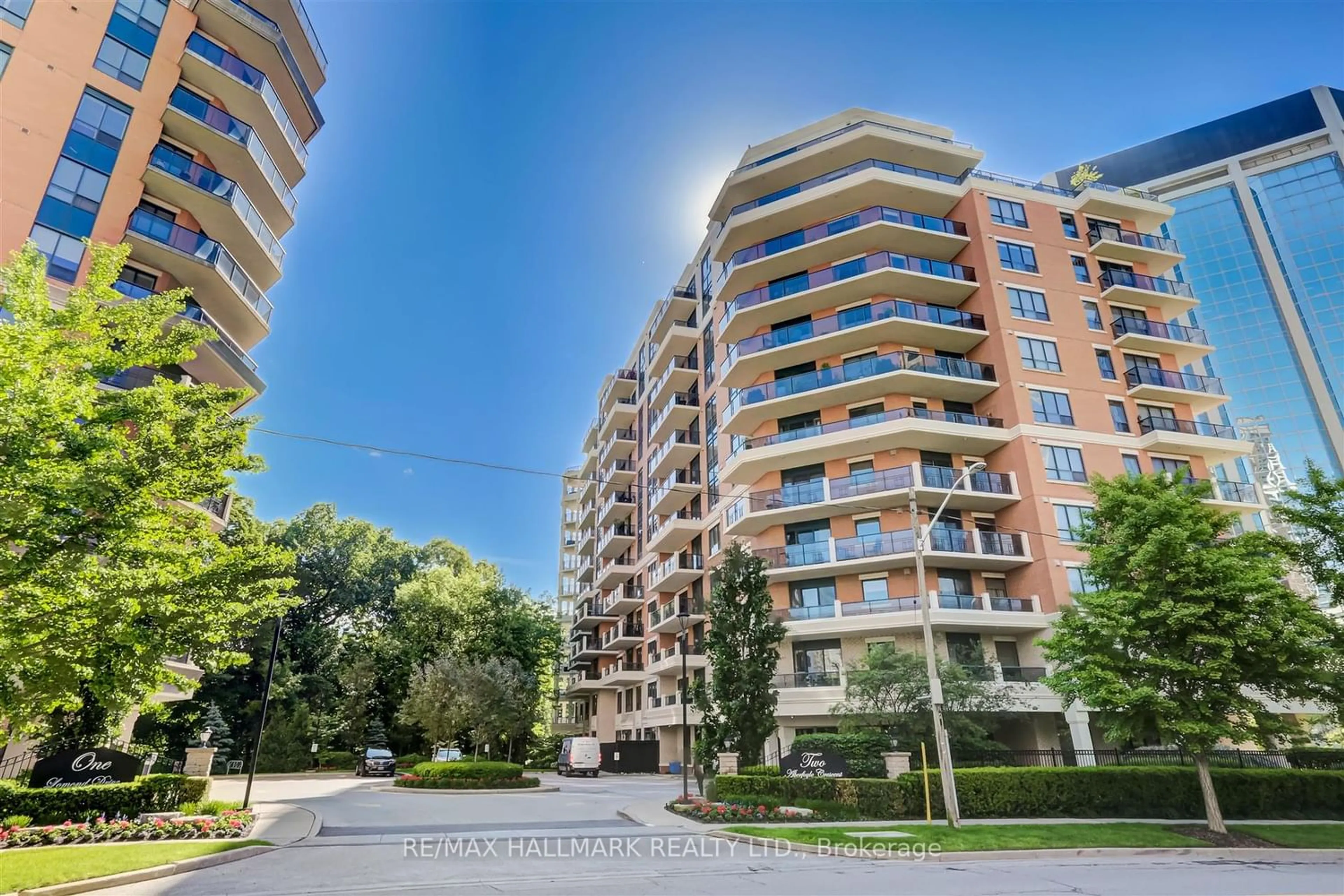 A pic from exterior of the house or condo, the street view for 2 Aberfoyle Cres #407, Toronto Ontario M8X 2Z8