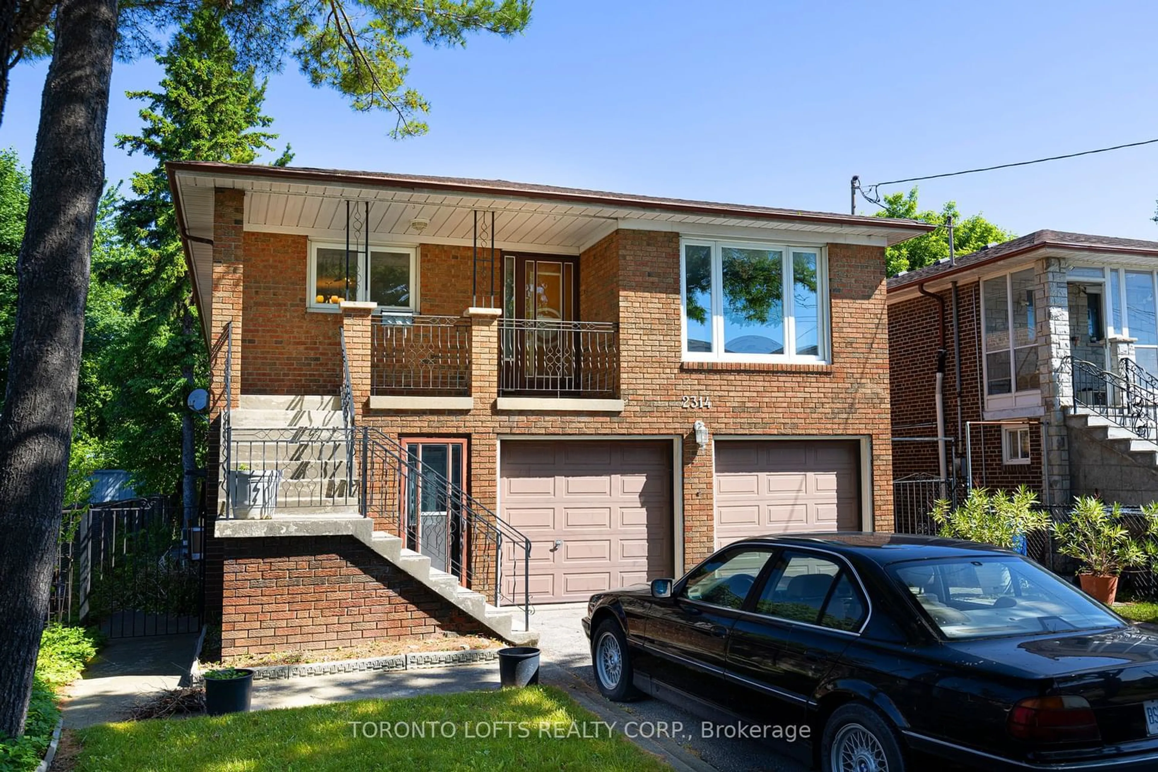 Home with brick exterior material for 2314 Sheppard Ave, Toronto Ontario M9M 1M2