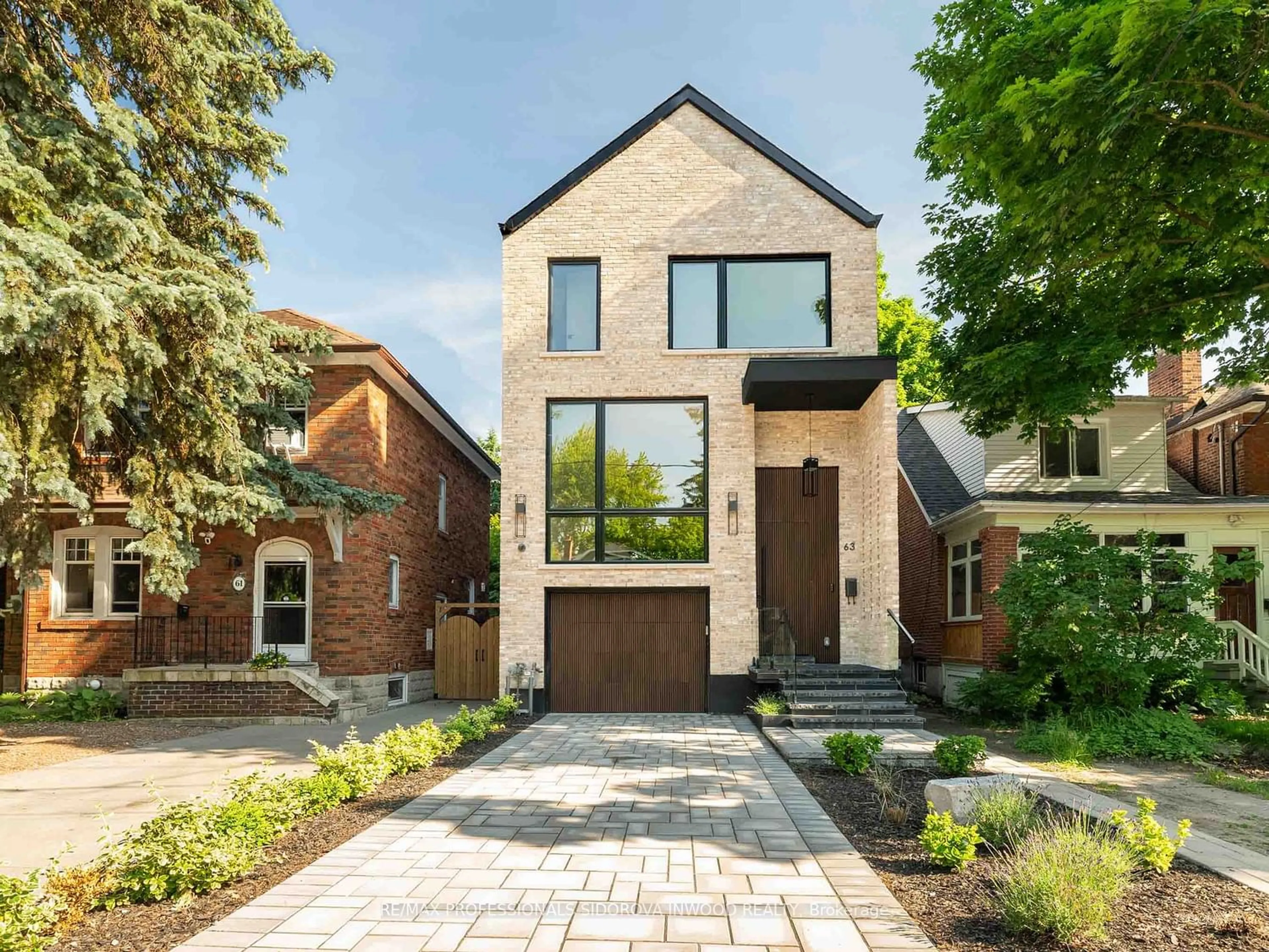 Home with brick exterior material for 63 Methuen Ave, Toronto Ontario M6S 1Z7