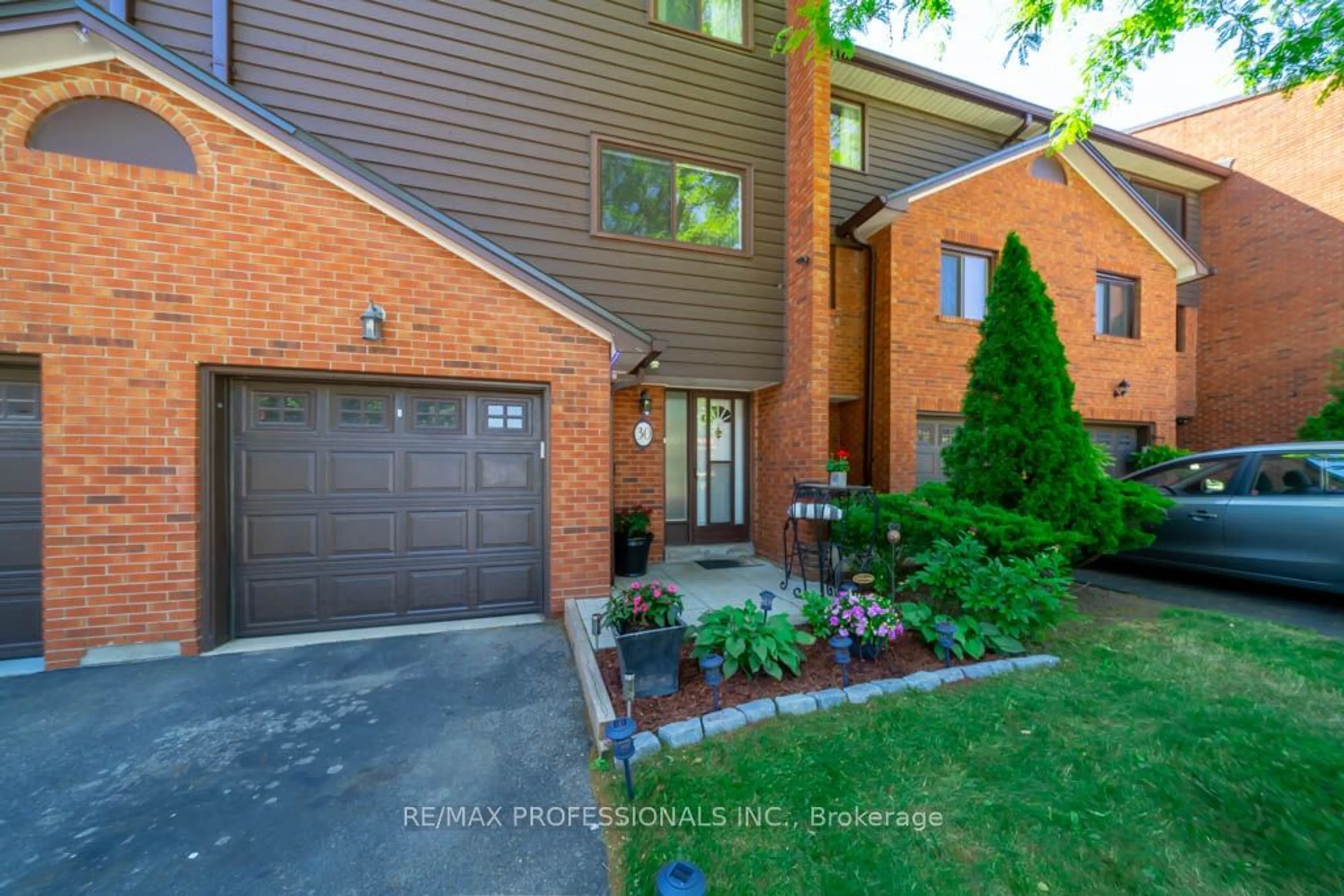 Home with brick exterior material for 4230 Fieldgate Dr #30, Mississauga Ontario L4W 2M5