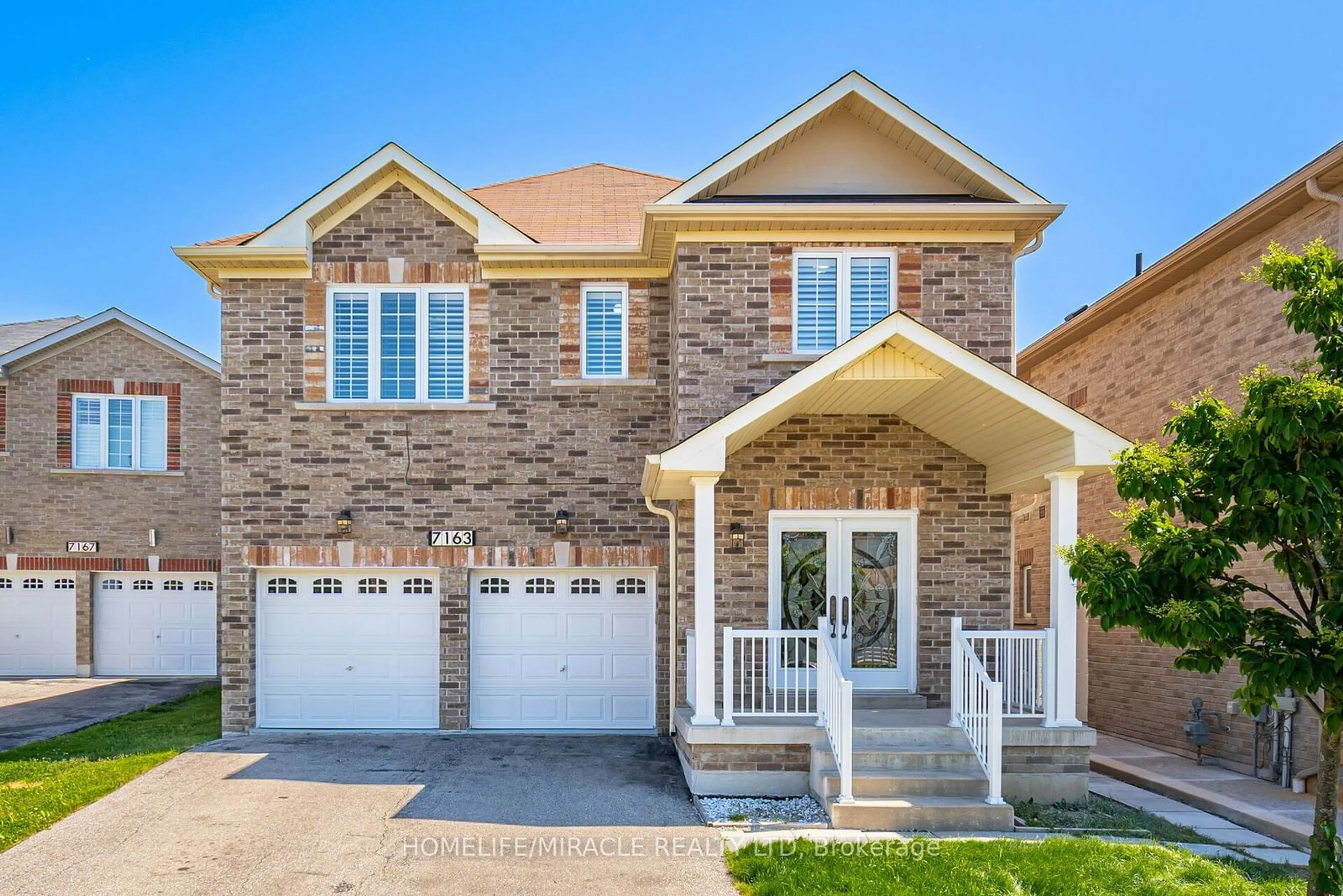 Home with brick exterior material for 7163 Wrigley Crt, Mississauga Ontario L5W 0C8