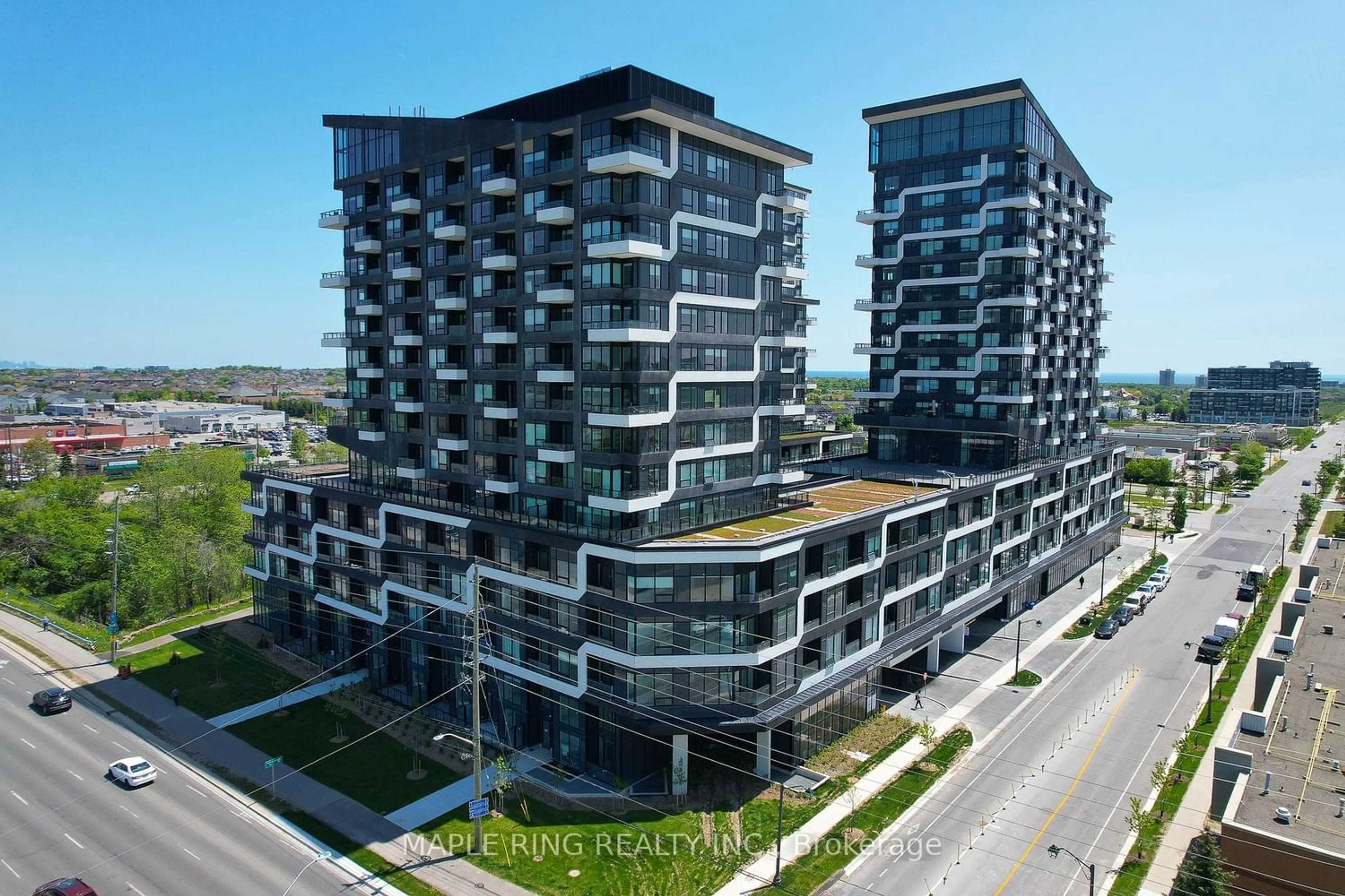 A pic from exterior of the house or condo for 2489 Taunton Rd #212, Oakville Ontario L6H 3R9