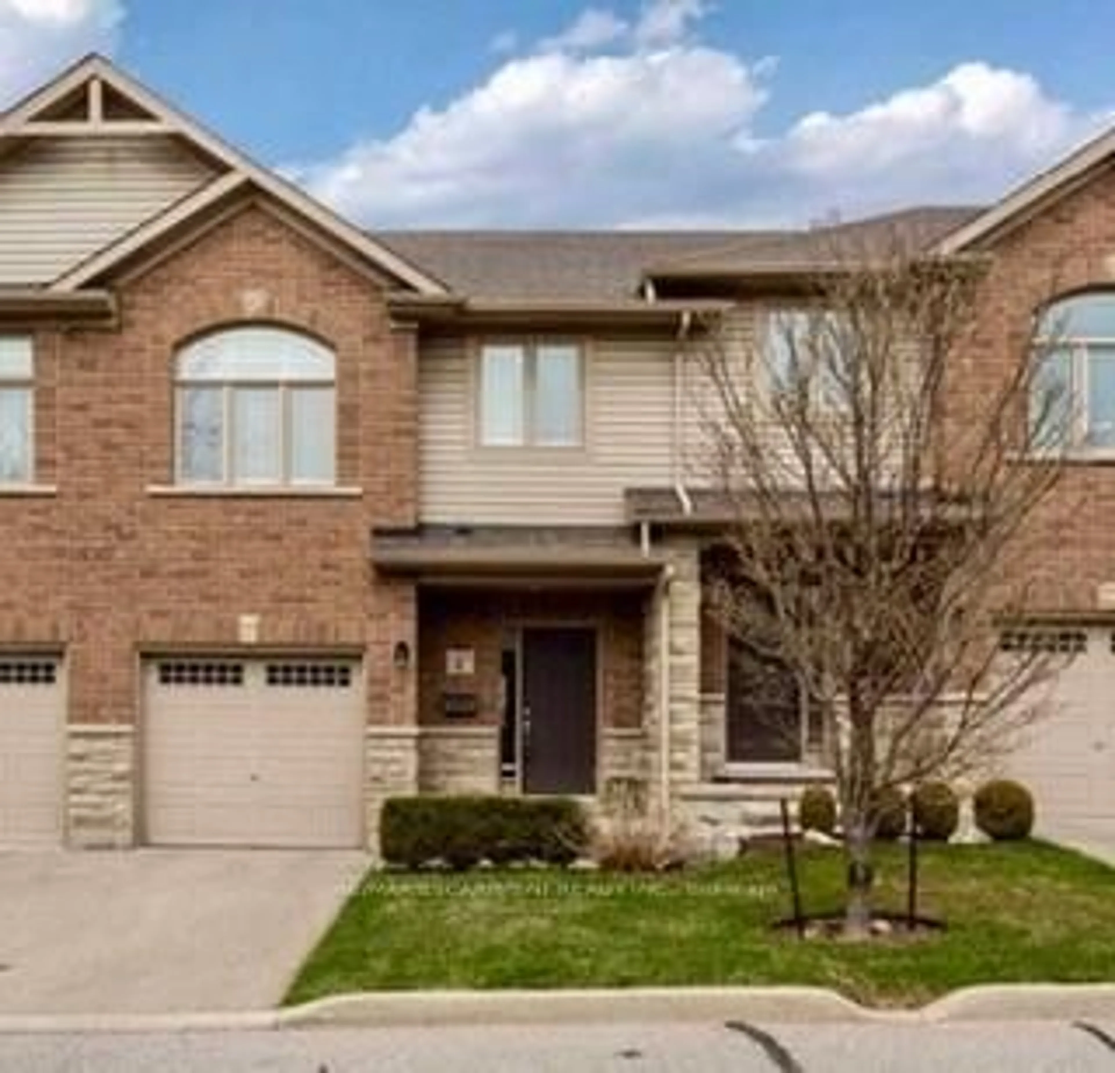 Home with brick exterior material for 1491 Plains Rd #11, Burlington Ontario L7H 4H1