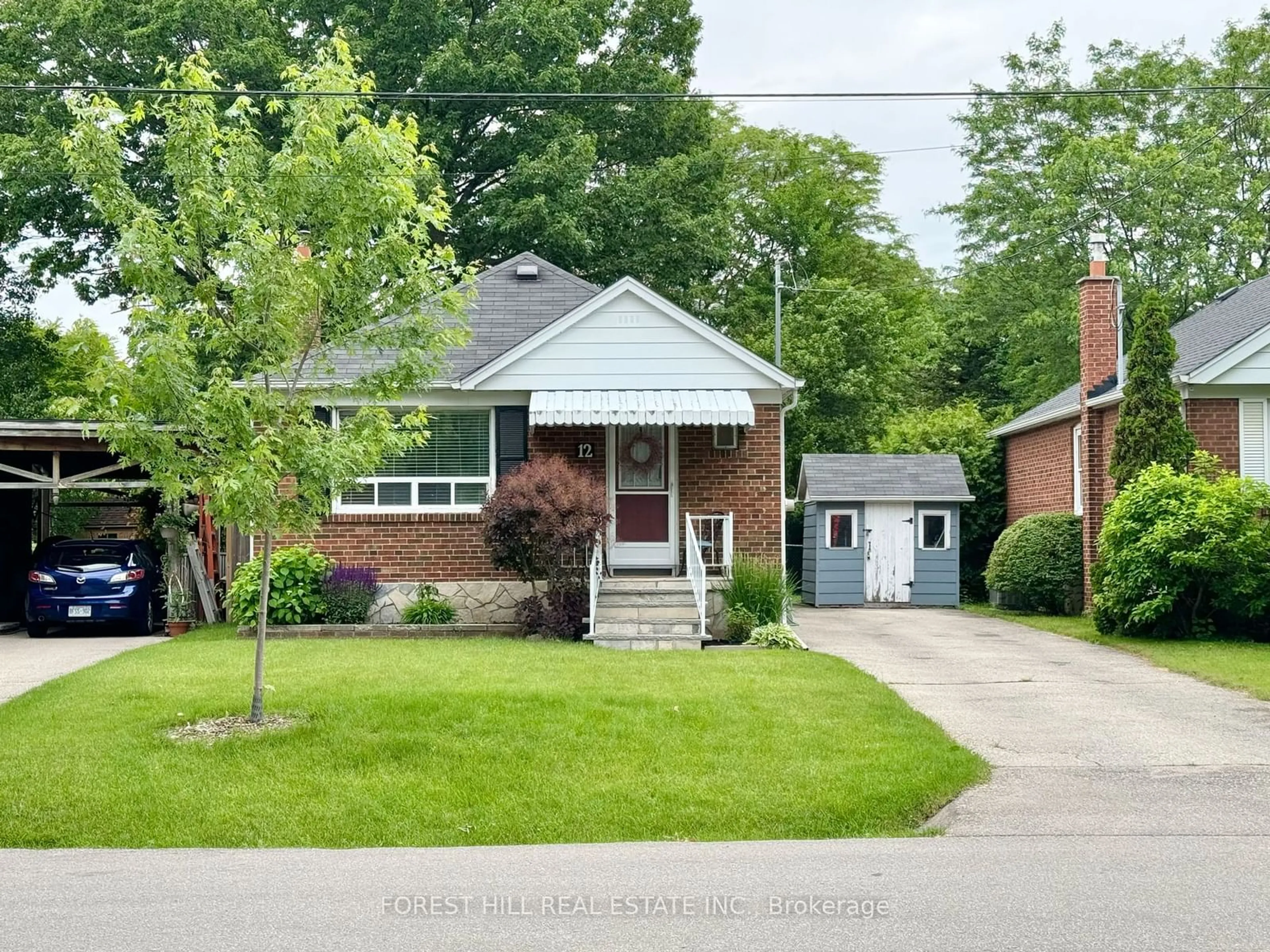 Frontside or backside of a home for 12 Westleigh Cres, Toronto Ontario M8W 3Z7