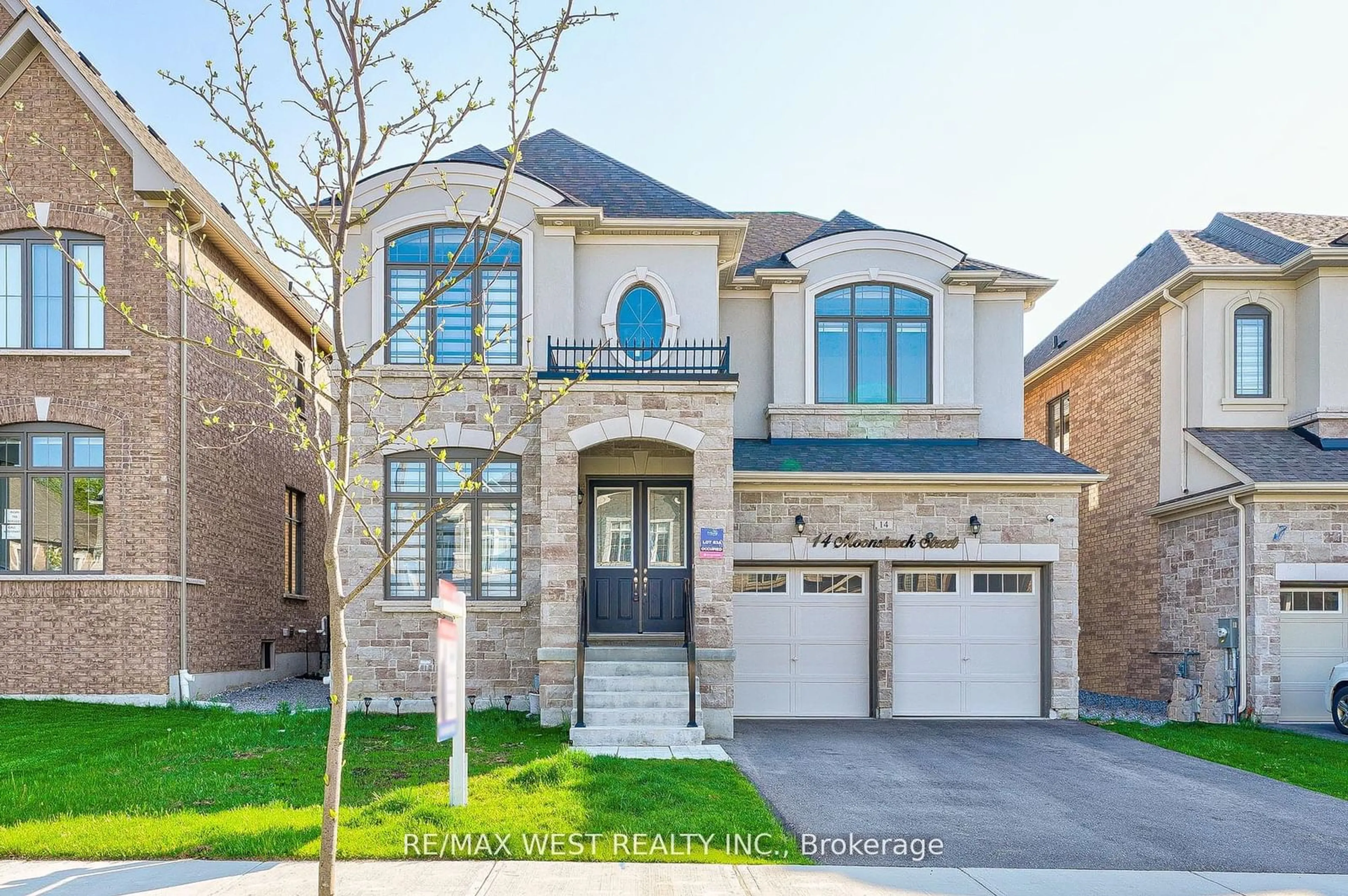 Home with brick exterior material for 14 Moonstruck St, Caledon Ontario L7C 4G3
