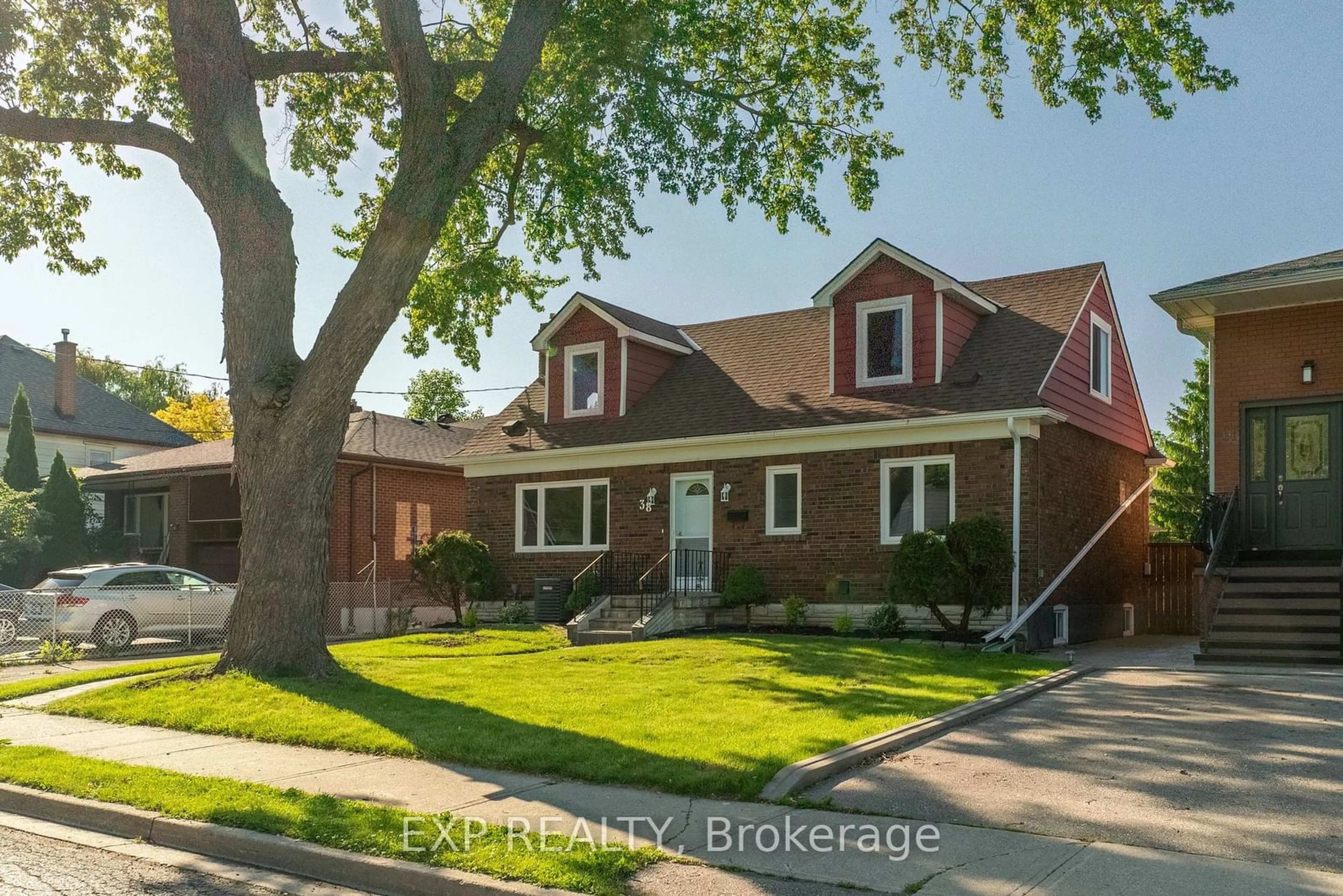 Frontside or backside of a home for 38 Macdonald St, Toronto Ontario M8V 1Y4