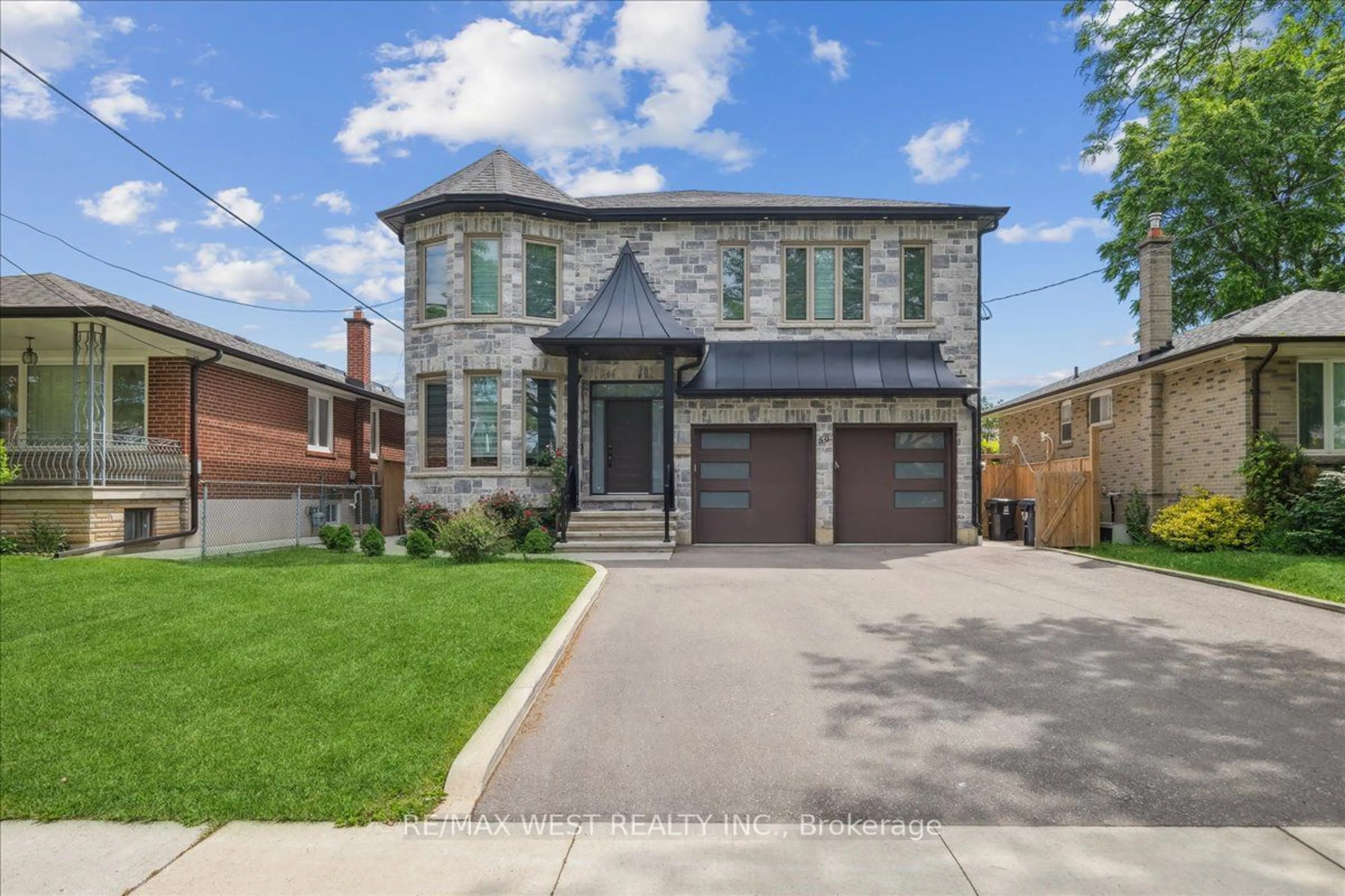 Home with brick exterior material for 59 Maniza Rd, Toronto Ontario M3K 1R8