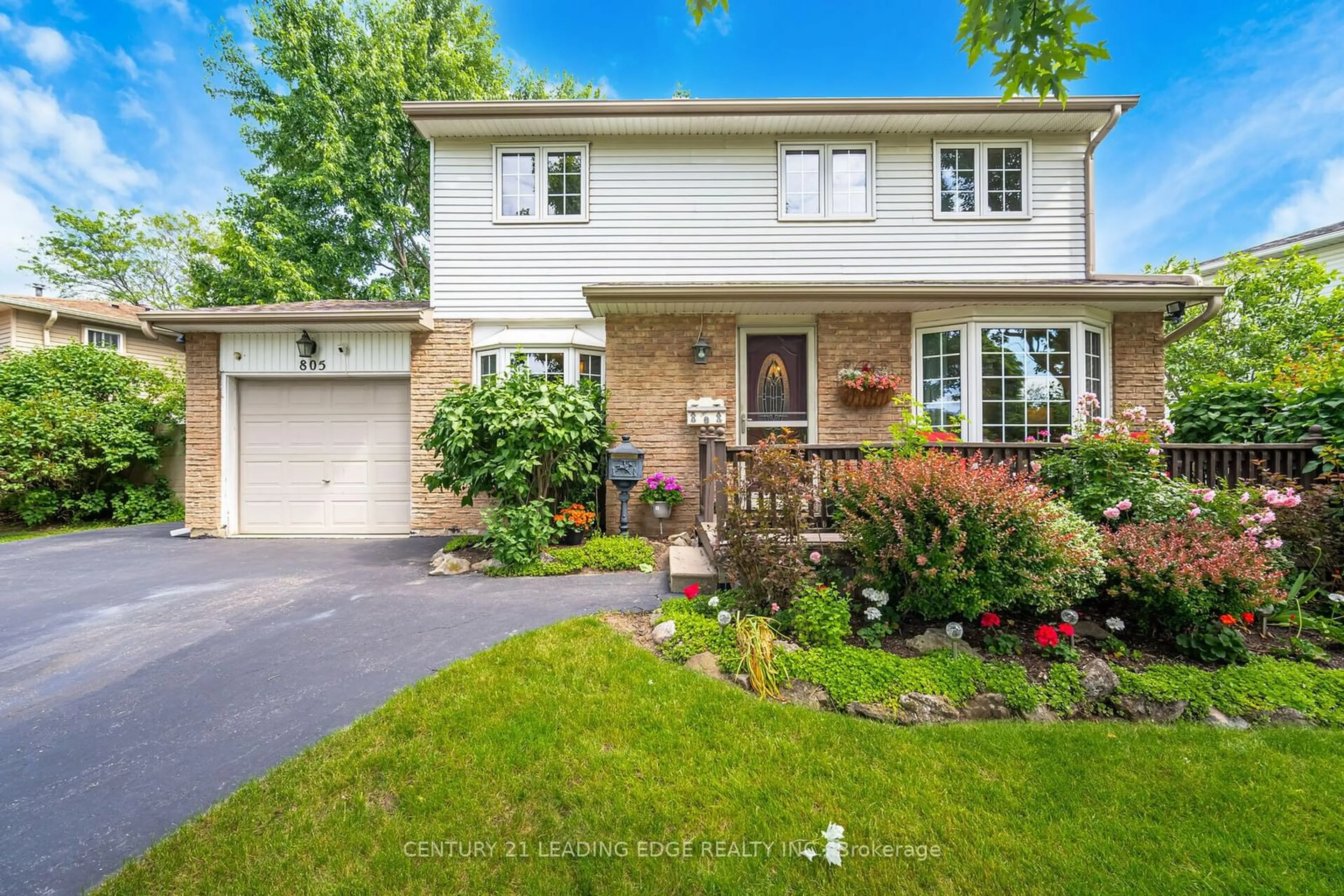 Frontside or backside of a home for 805 Cabot Tr, Milton Ontario L9T 3S7