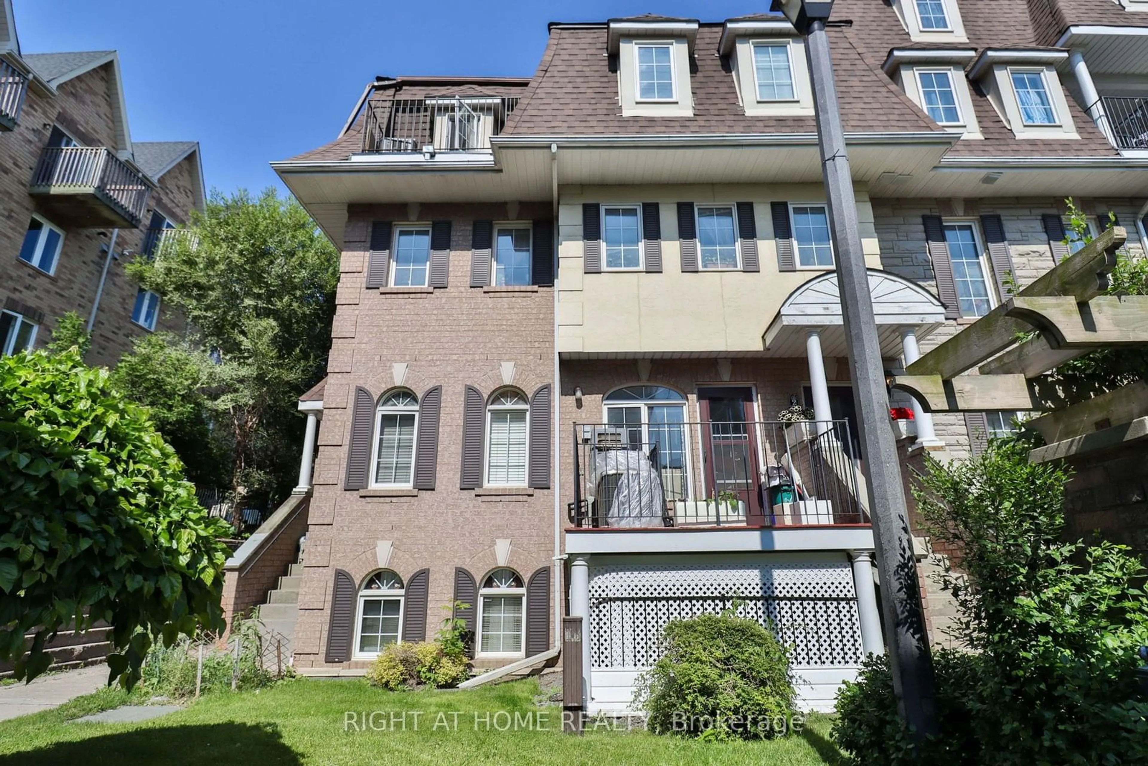 A pic from exterior of the house or condo for 50 Sidney Belsey Cres #202, Toronto Ontario M6M 5H9