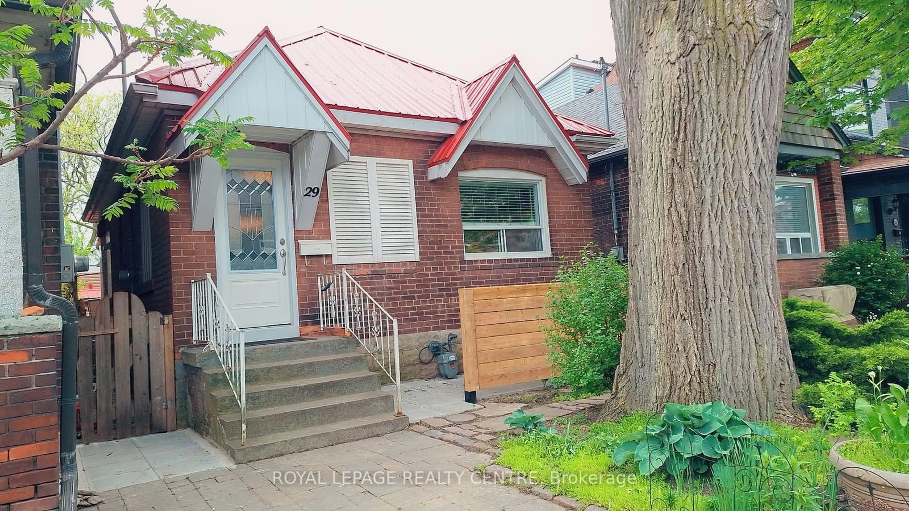 Frontside or backside of a home for 29 Hook Ave, Toronto Ontario M6P 1T3