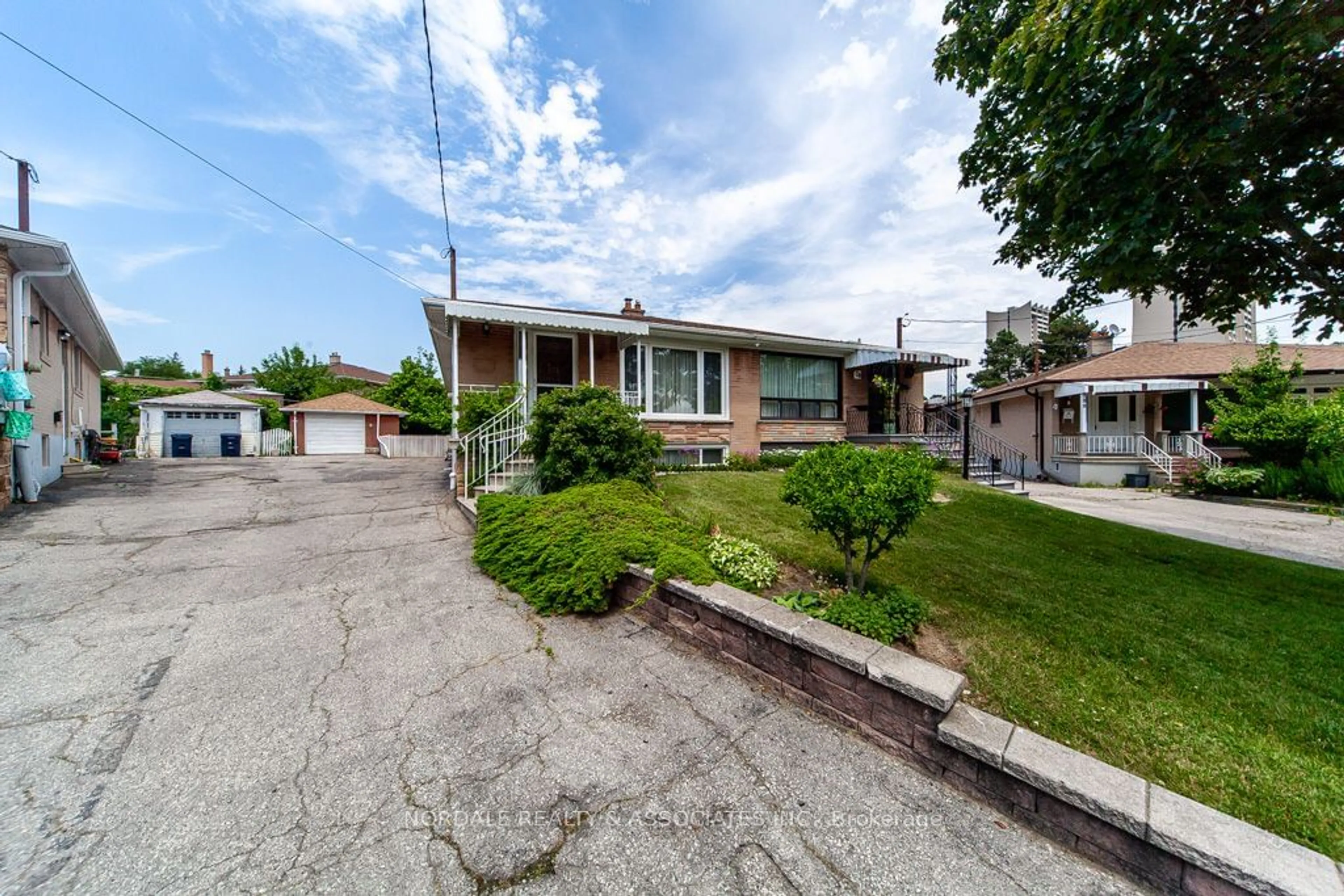 Frontside or backside of a home for 26 Rabton Crt, Toronto Ontario M3L 1Y2