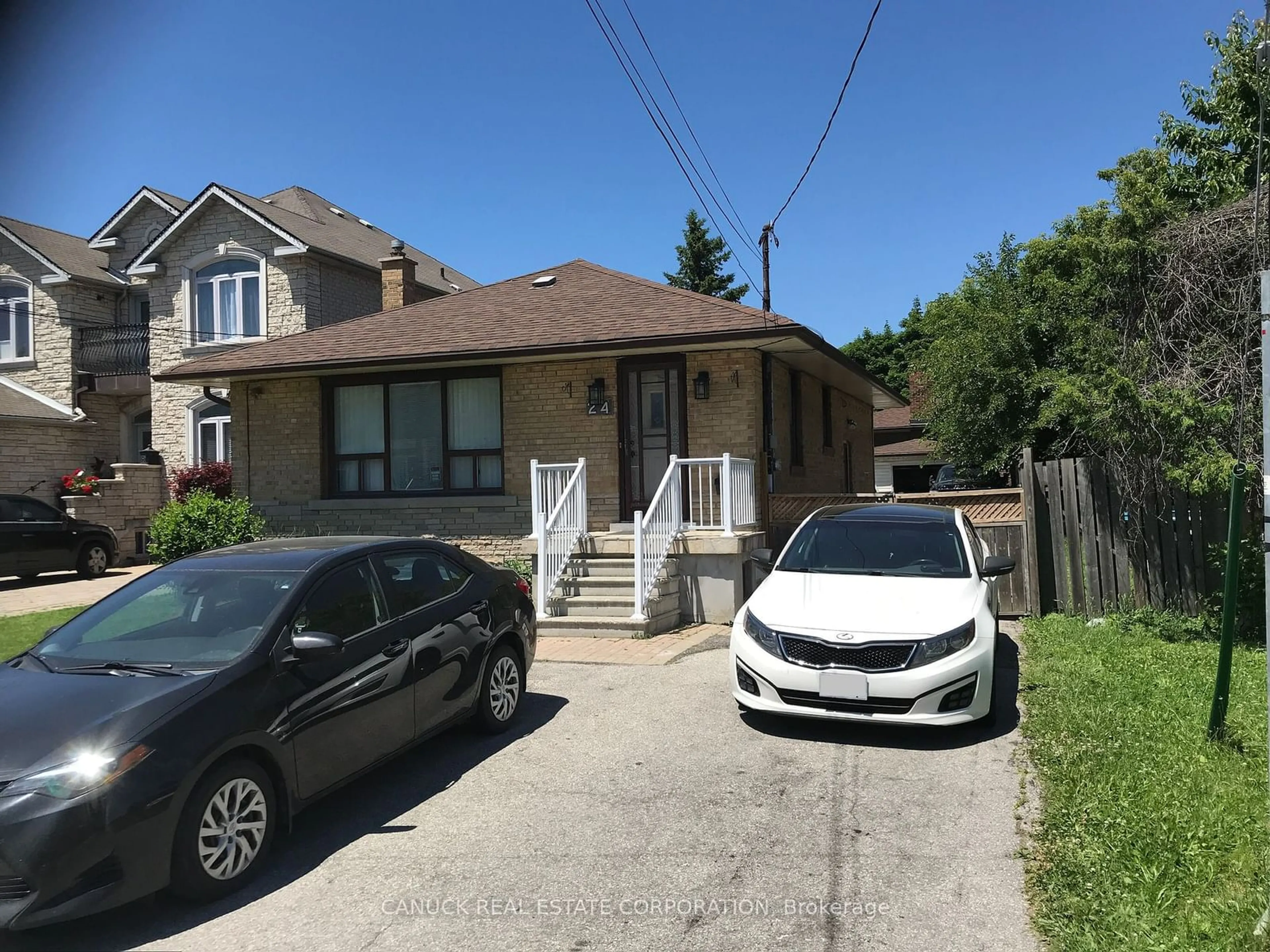 Frontside or backside of a home for 24 Dee Ave, Toronto Ontario M9N 1S9