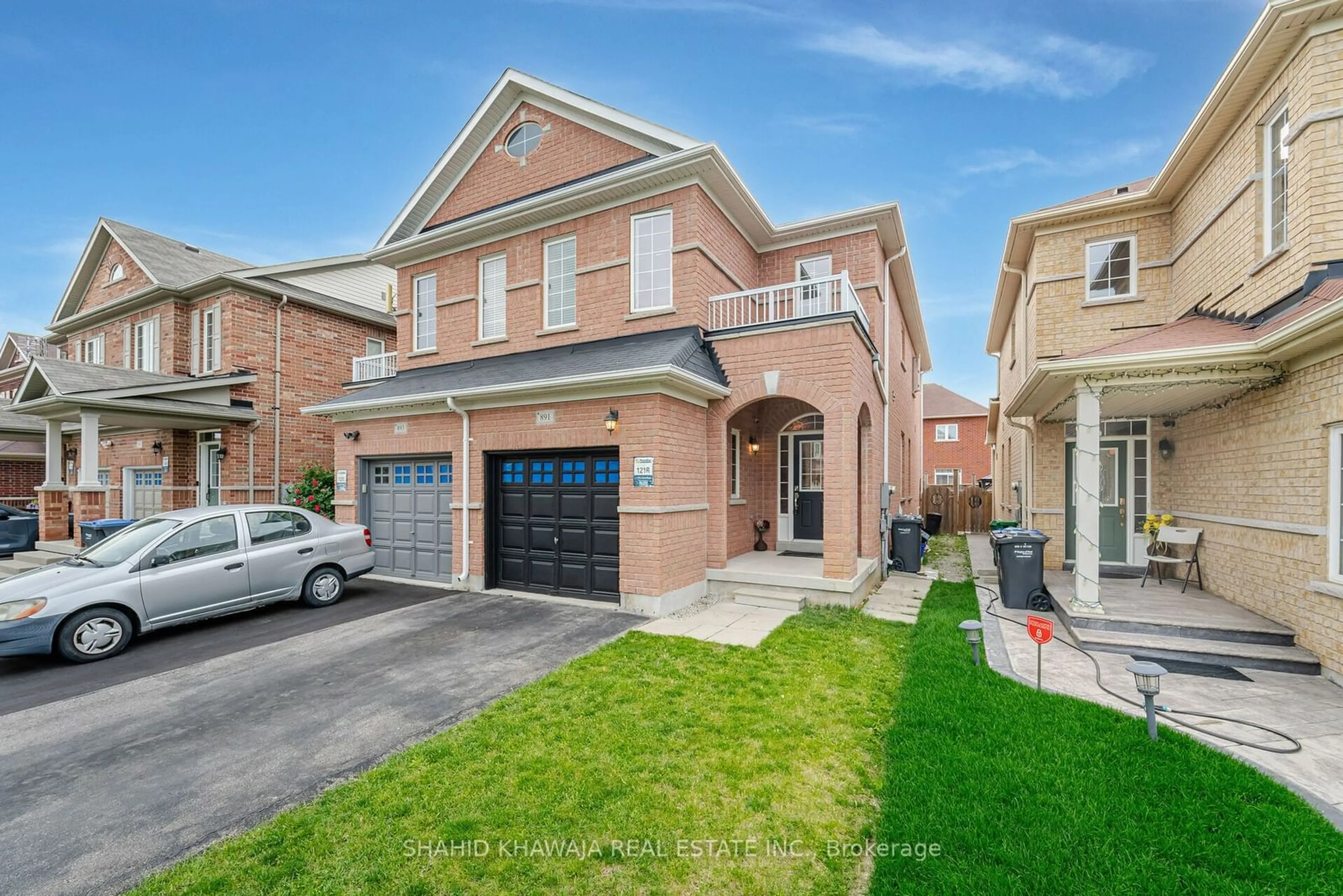 Home with brick exterior material for 891 Oasis Dr, Mississauga Ontario L5V 0C7